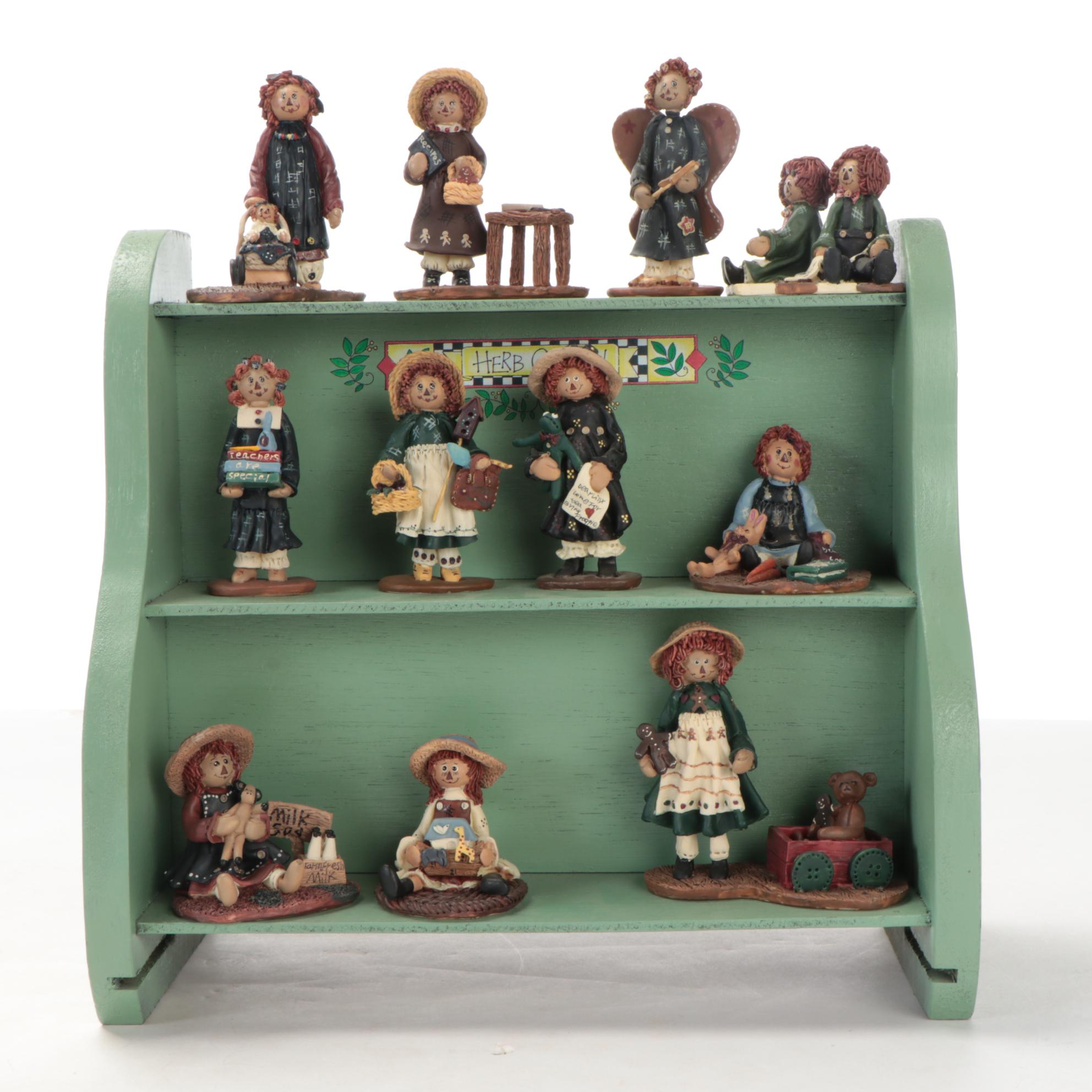 Enesco and Other Raggedy Ann & Andy Figurines with Display Shelves