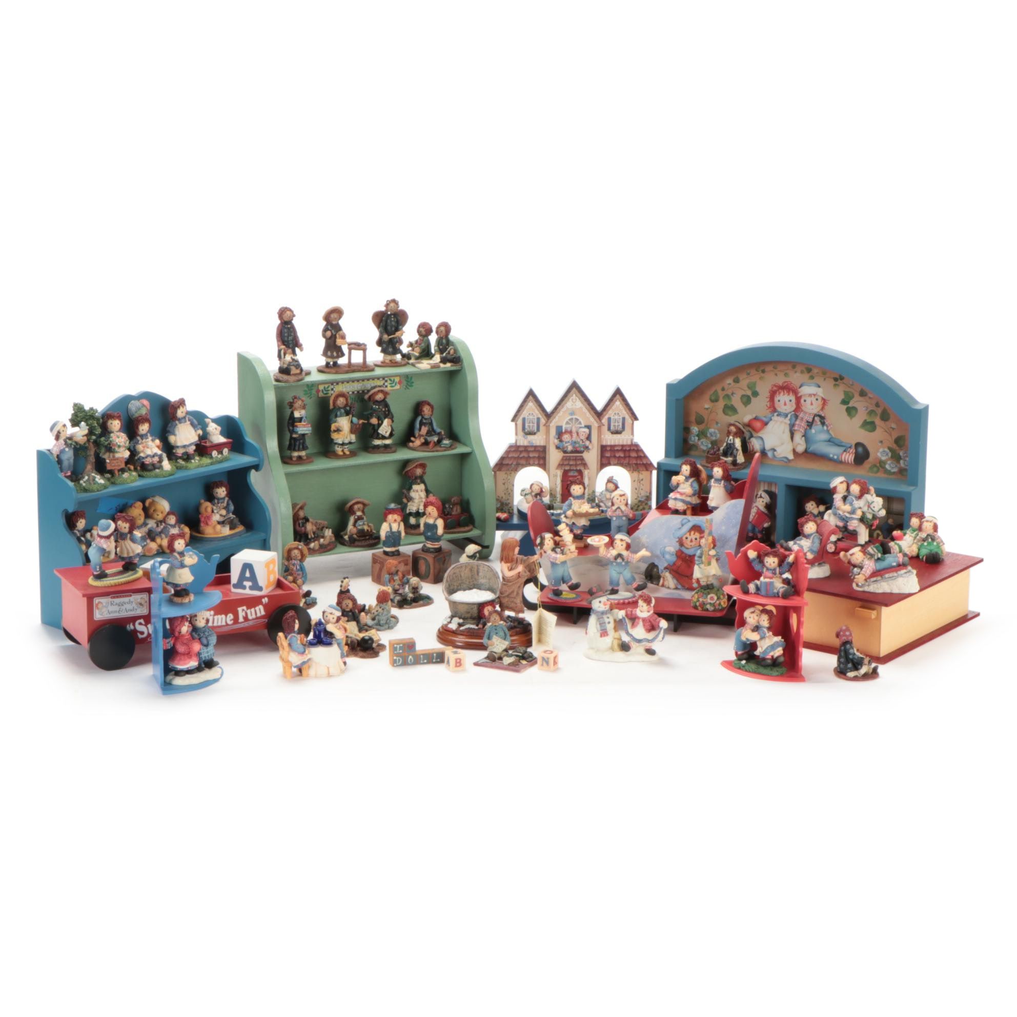 Enesco and Other Raggedy Ann & Andy Figurines with Display Shelves