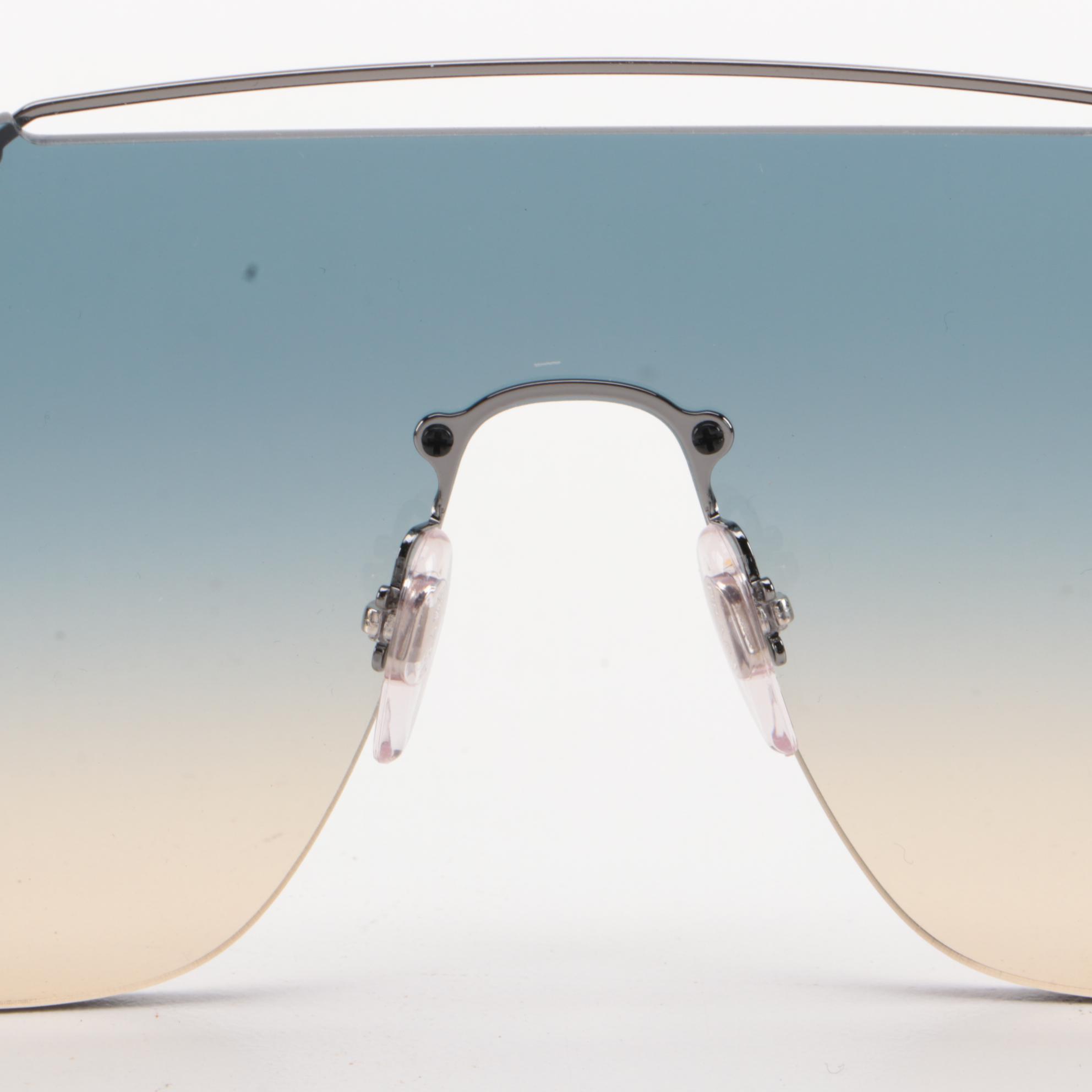 Prada Linea Rossa SPS 51T Sunglasses with Blue Gradient Lenses