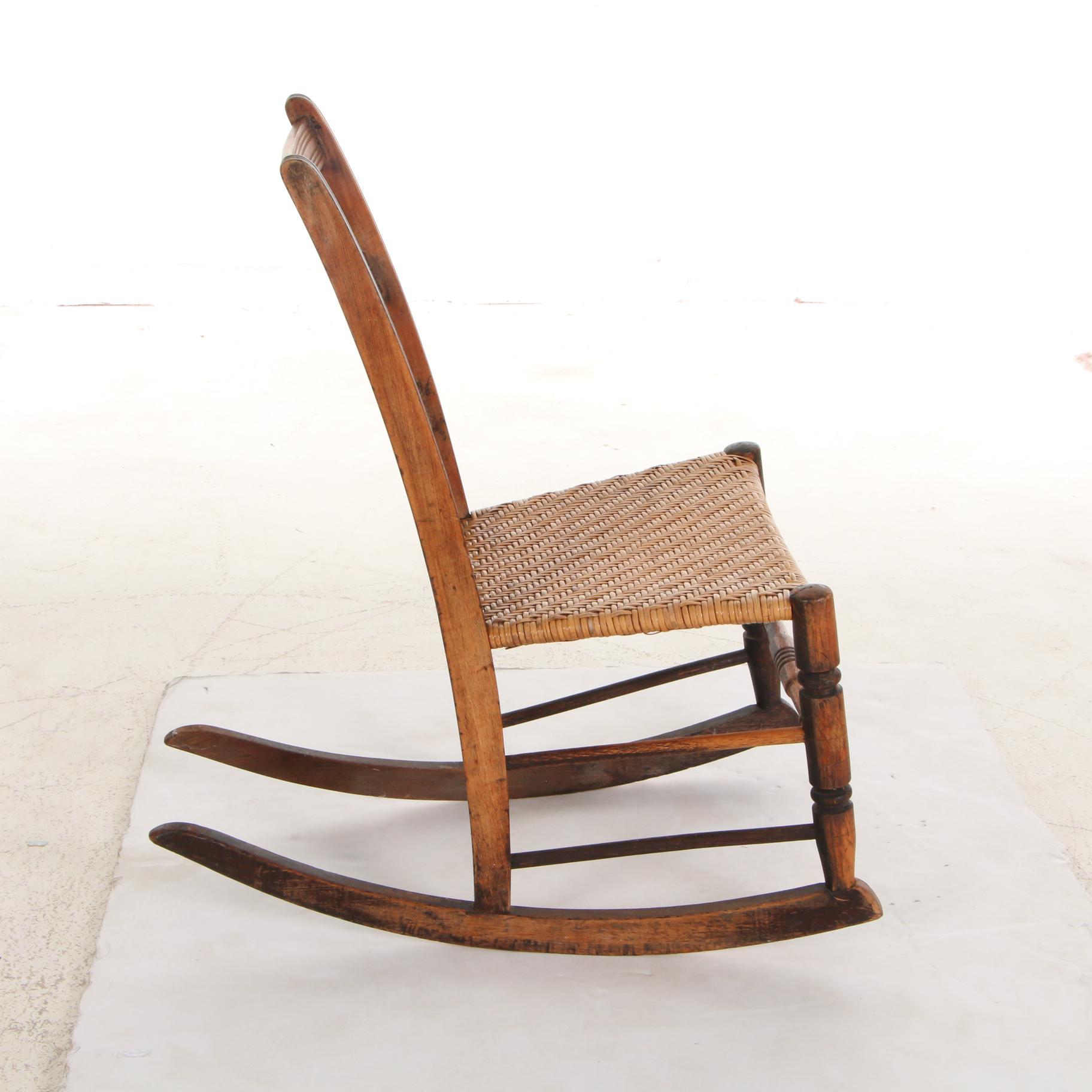 Victorian Wooden Rocking Chair with Woven Cane Seat, Early to Mid 20th Century