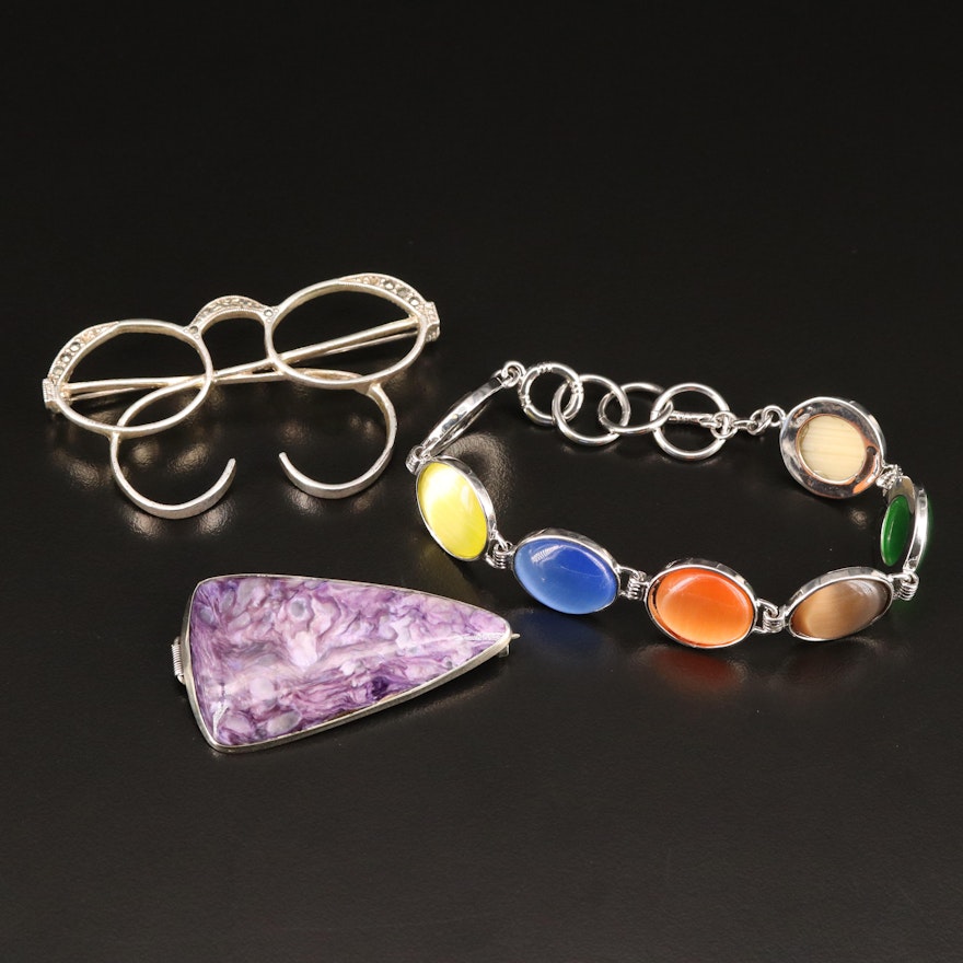 Jewelry Selection Featuring Charoite and Eyeglasses Brooches