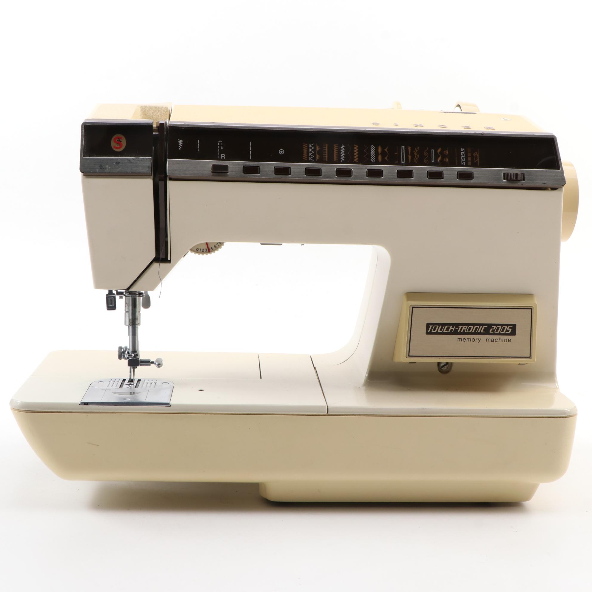 Singer Touch-Tronic 2005 Memory Sewing Machine and Buttonholer with Accessories