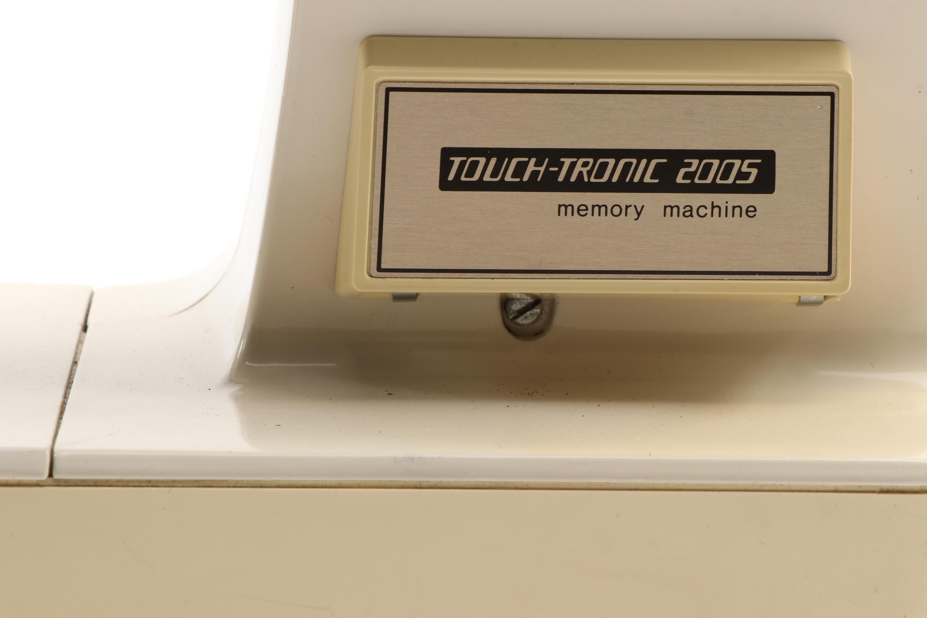 Singer Touch-Tronic 2005 Memory Sewing Machine and Buttonholer with Accessories