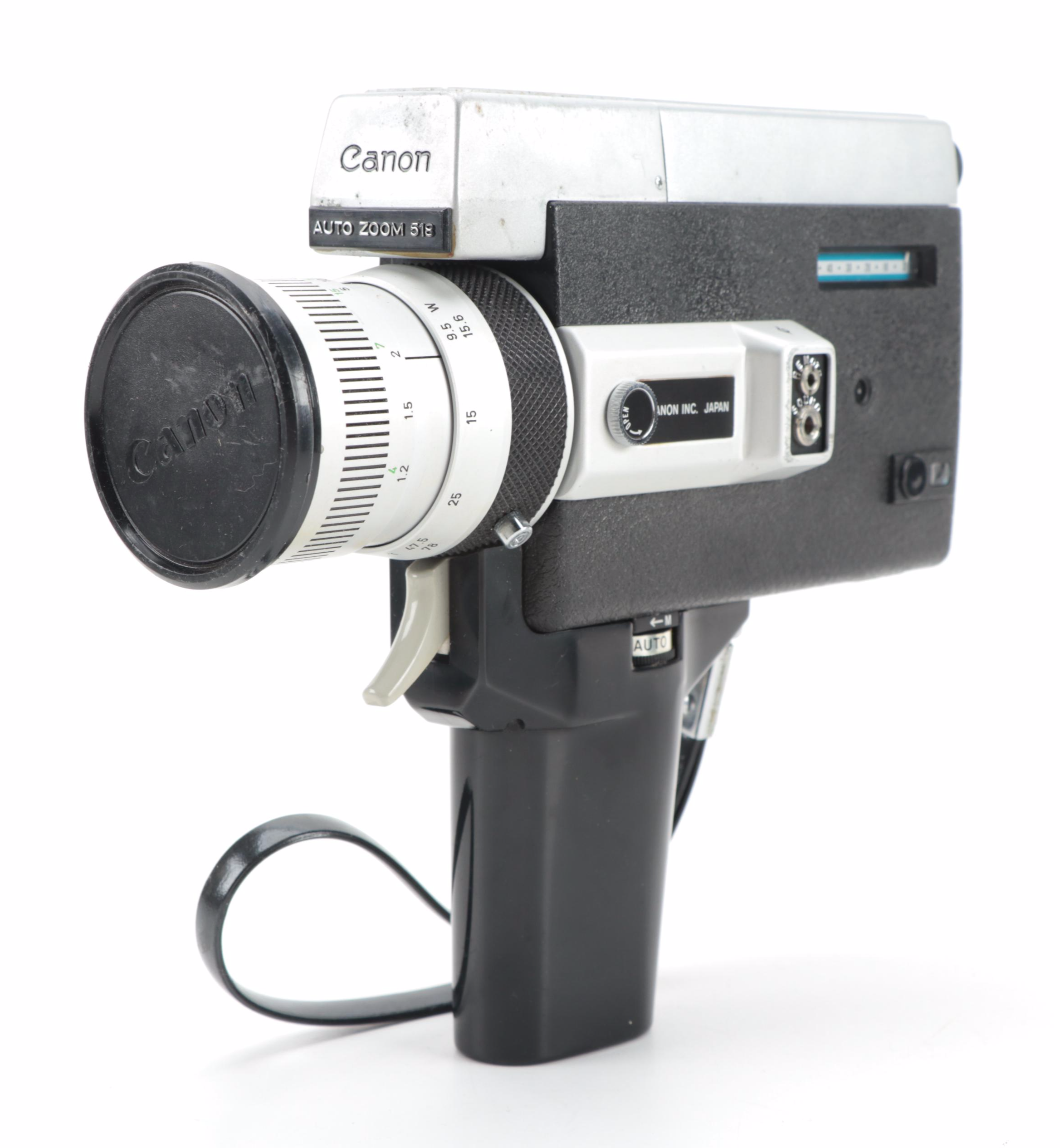 Canon "518 Auto Zoom Super 8" Movie Camera with Atlas-Warner Movie Light