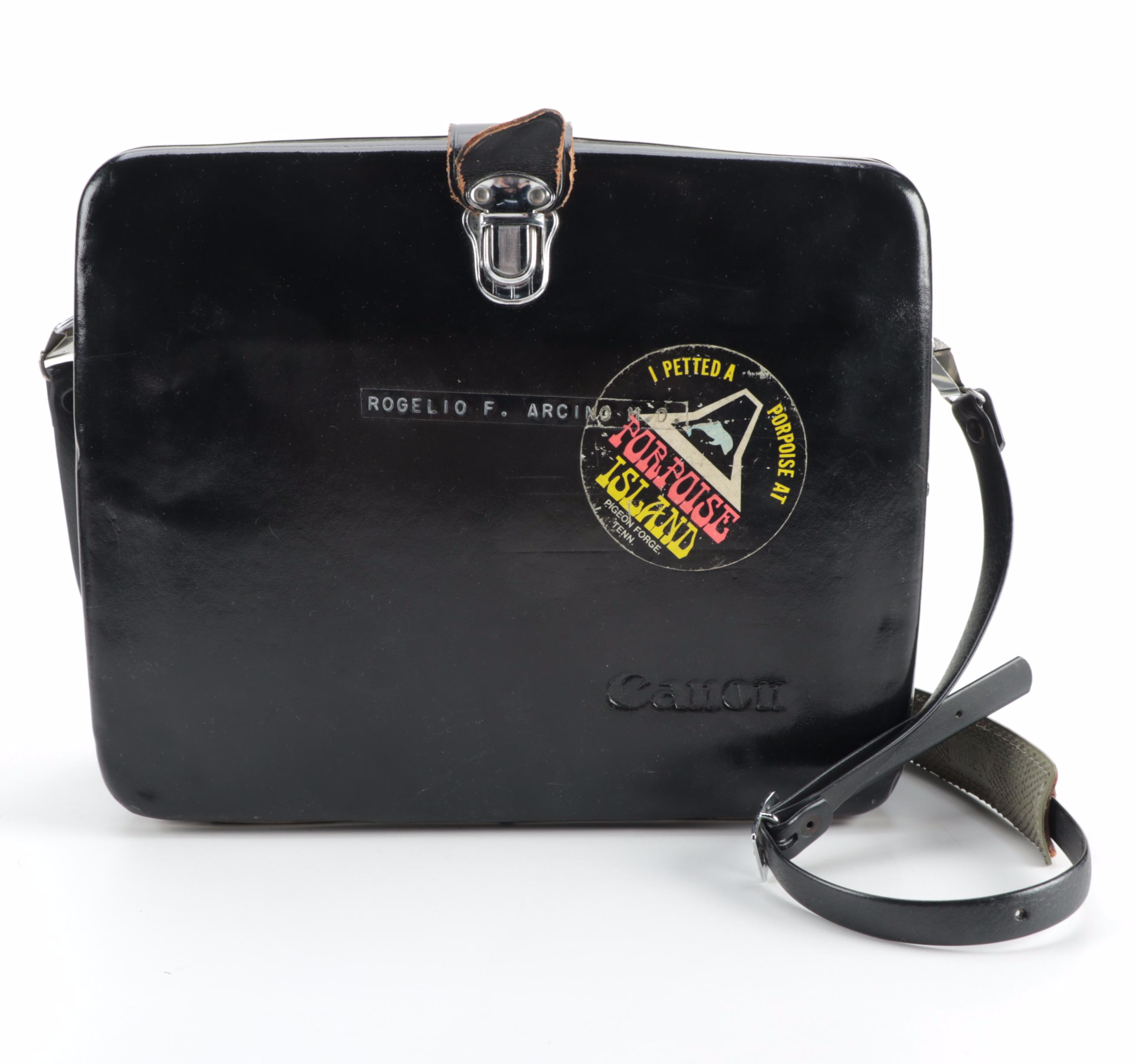 Canon "518 Auto Zoom Super 8" Movie Camera with Atlas-Warner Movie Light