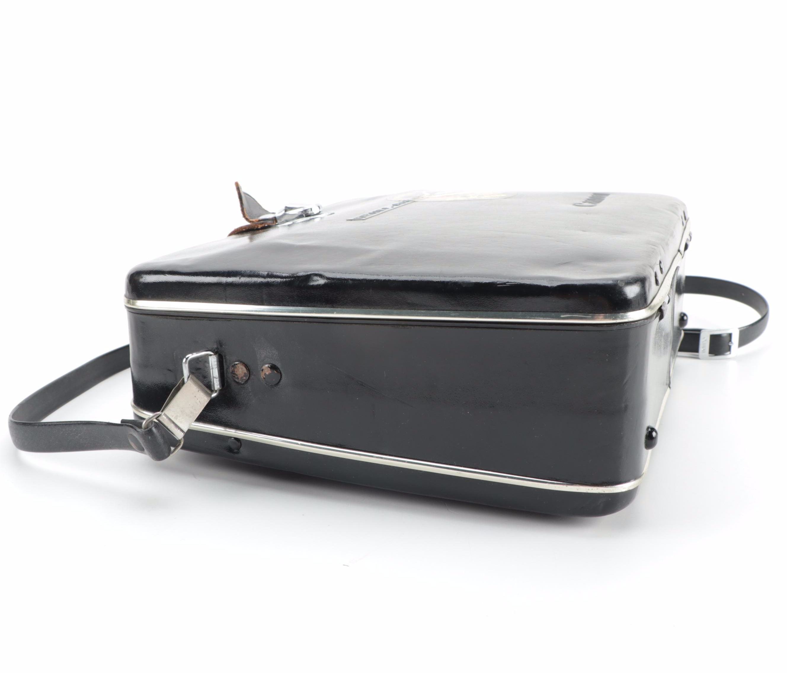 Canon "518 Auto Zoom Super 8" Movie Camera with Atlas-Warner Movie Light