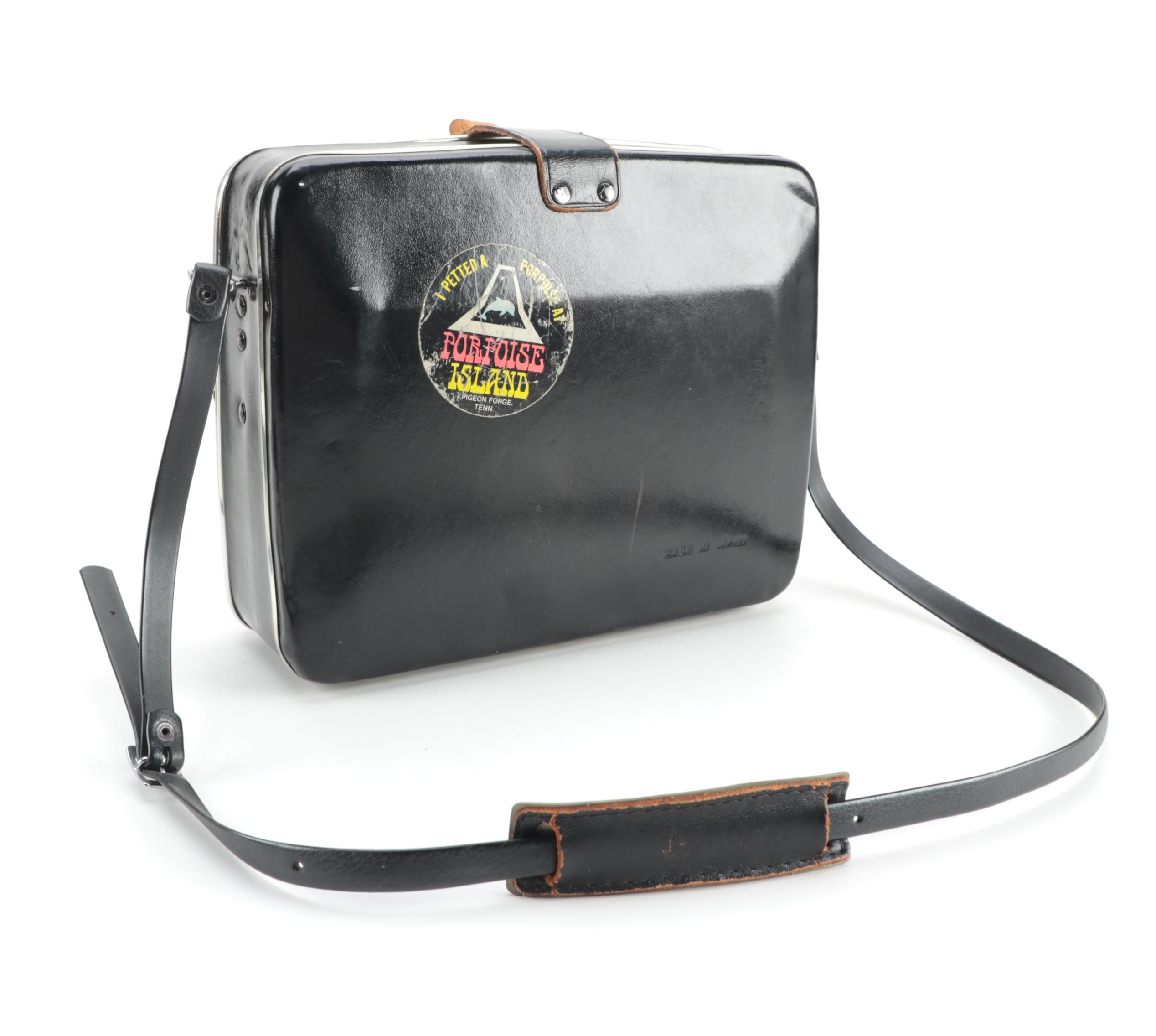 Canon "518 Auto Zoom Super 8" Movie Camera with Atlas-Warner Movie Light