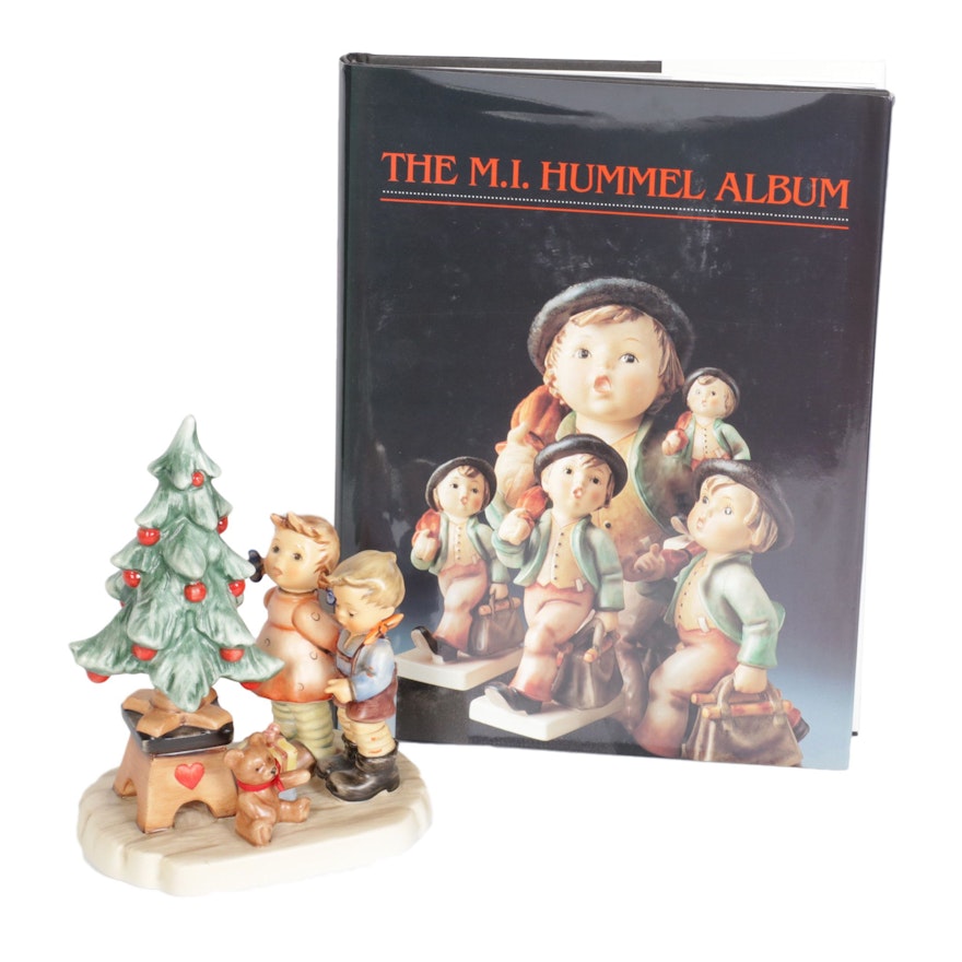 Goebel "Wonder of Christmas" Figurine with the M.I. Hummel Album
