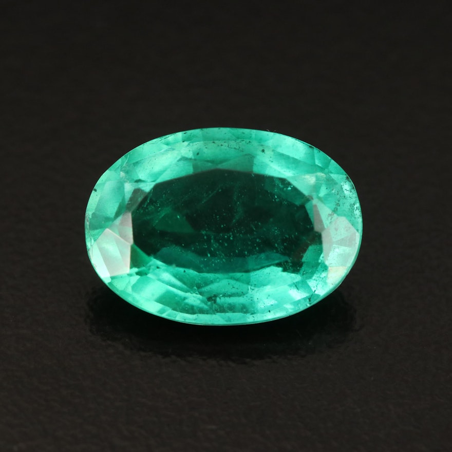 Loose Laboratory Grown Emerald and Topaz Triplet