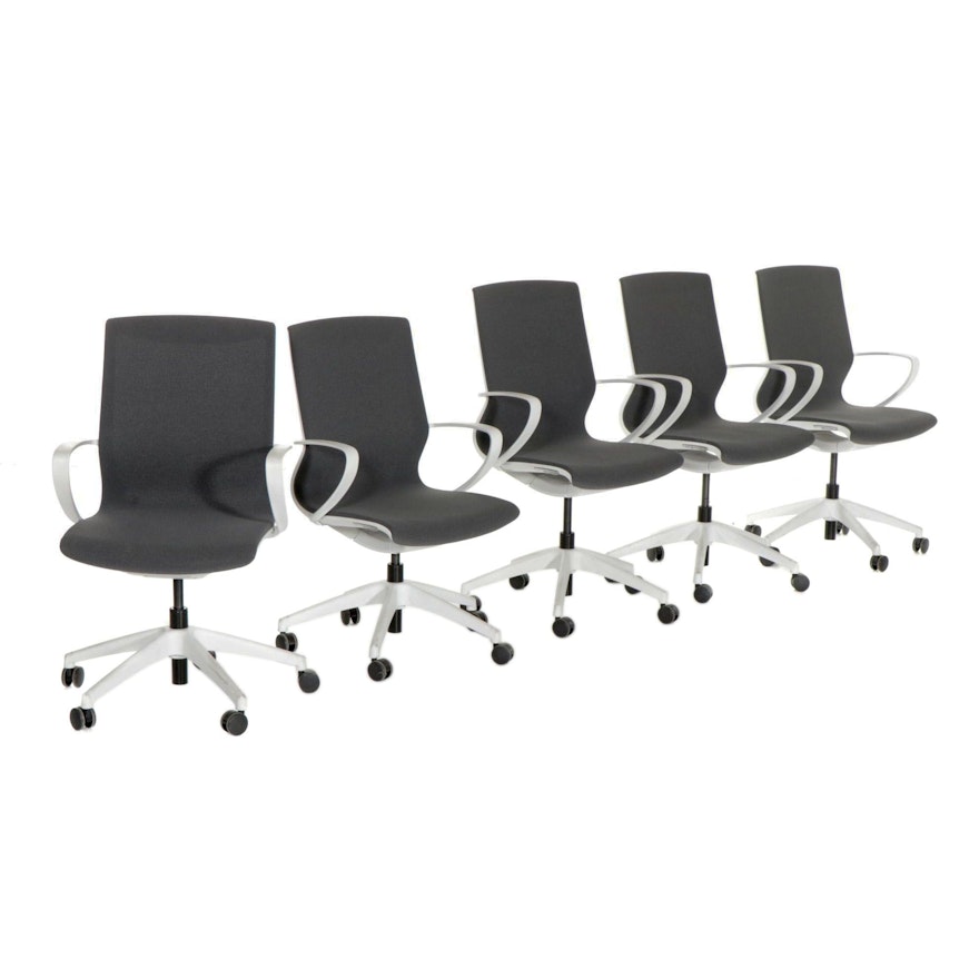 Five Molded Plastic Upholstered Office Chairs, 2010