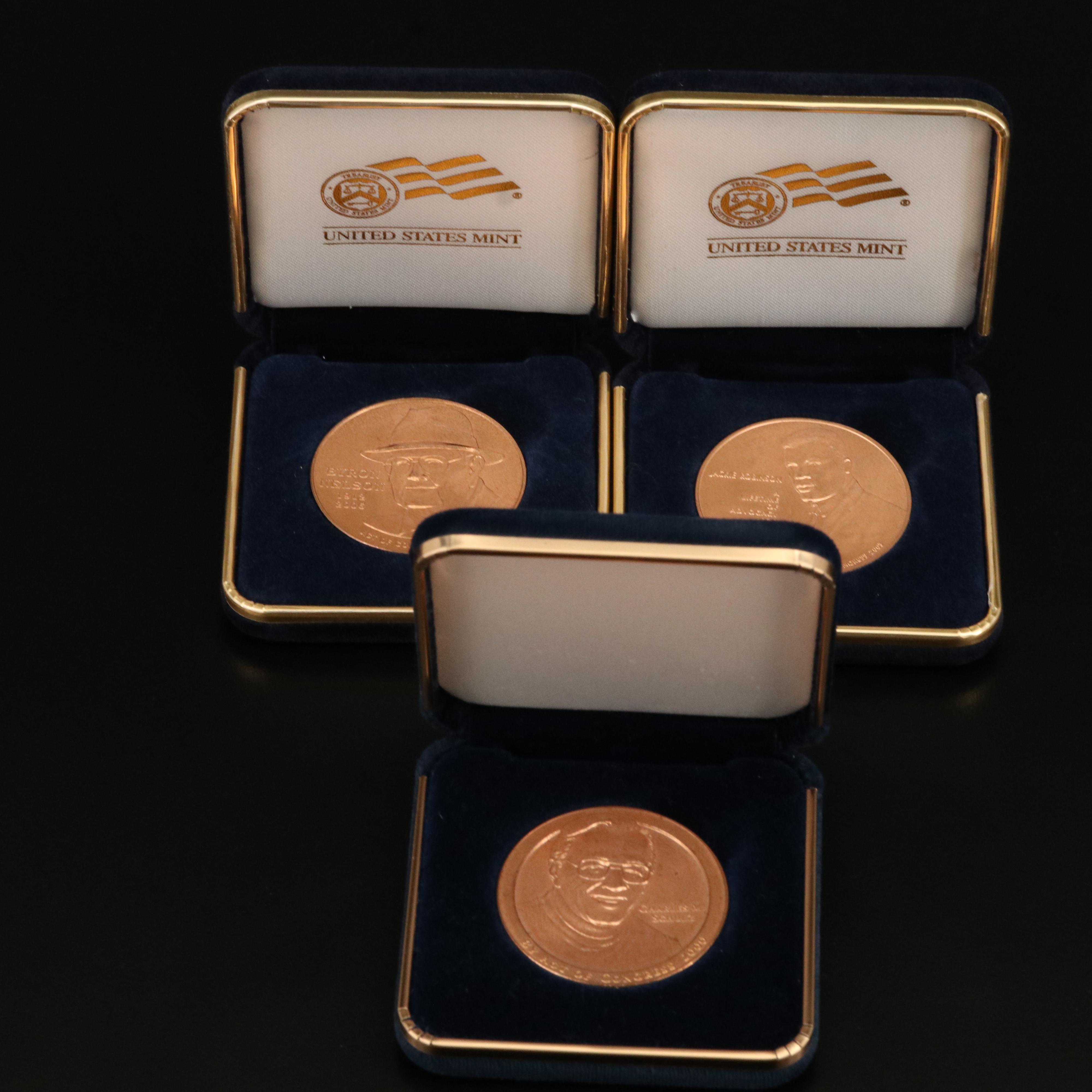 Bronze Medals of Jackie Robinson, Byron Nelson and Charles M. Schulz