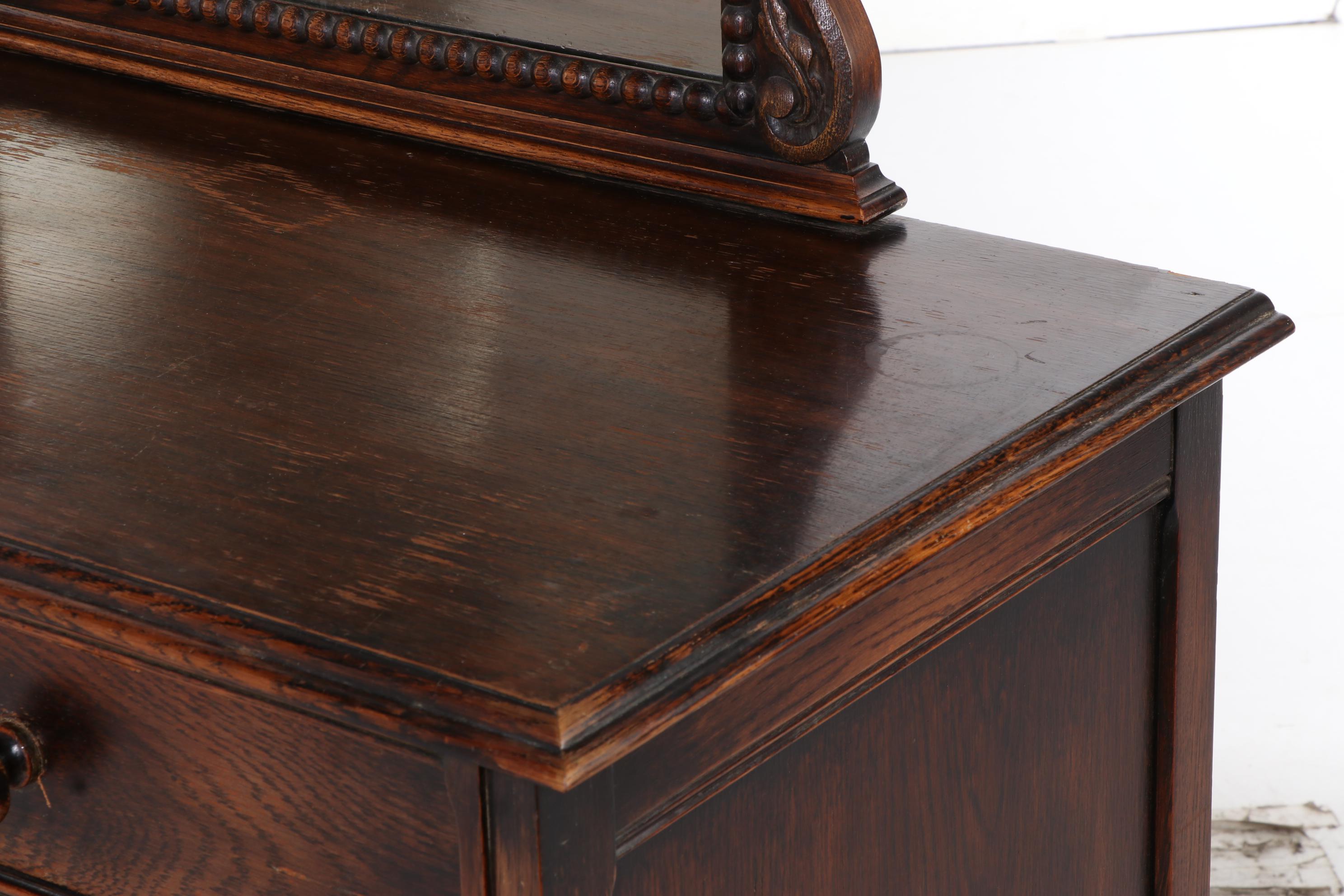 American Furniture Co. Jacobean Style Carved Oak Four-Drawer Dresser