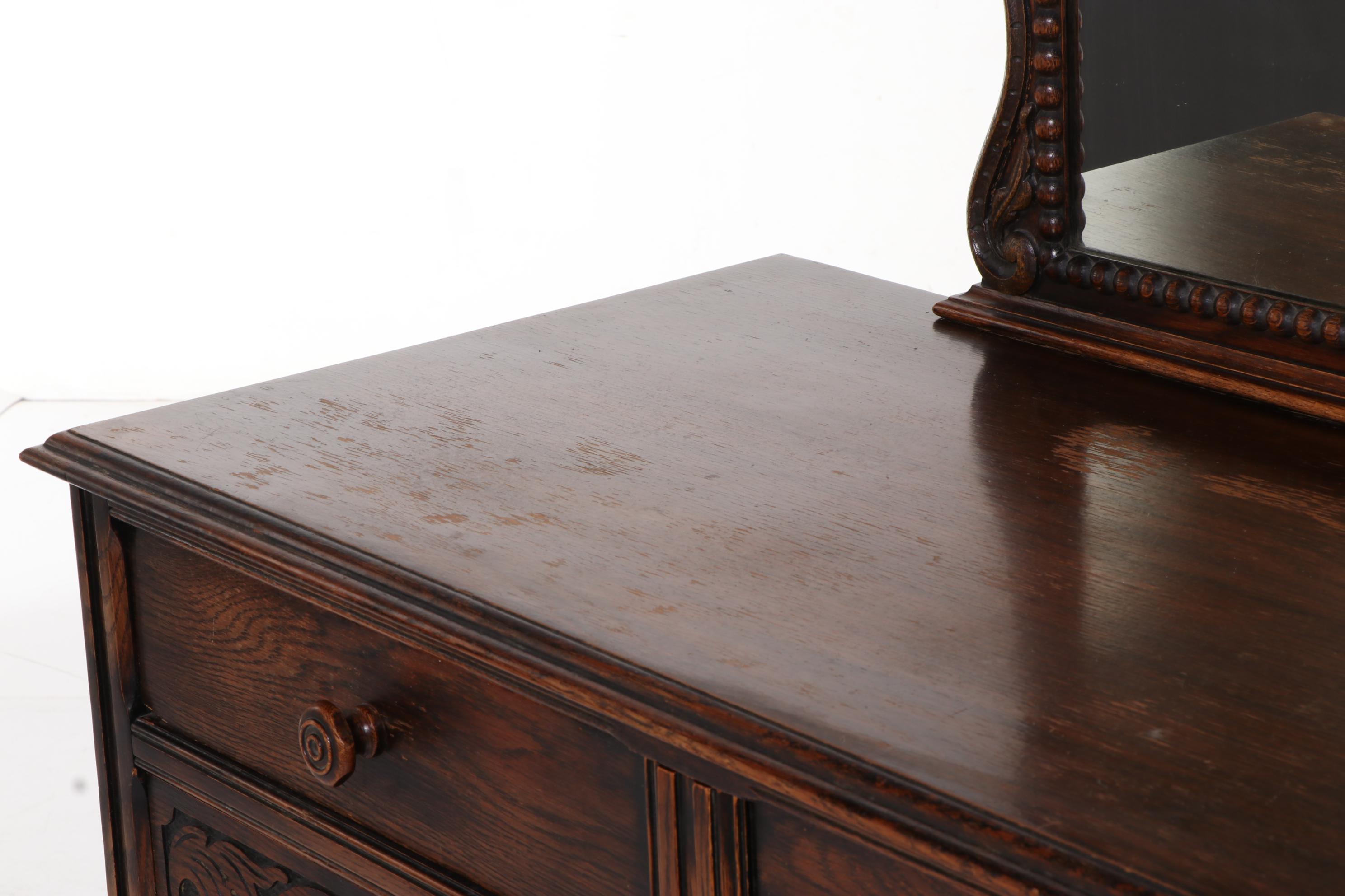 American Furniture Co. Jacobean Style Carved Oak Four-Drawer Dresser