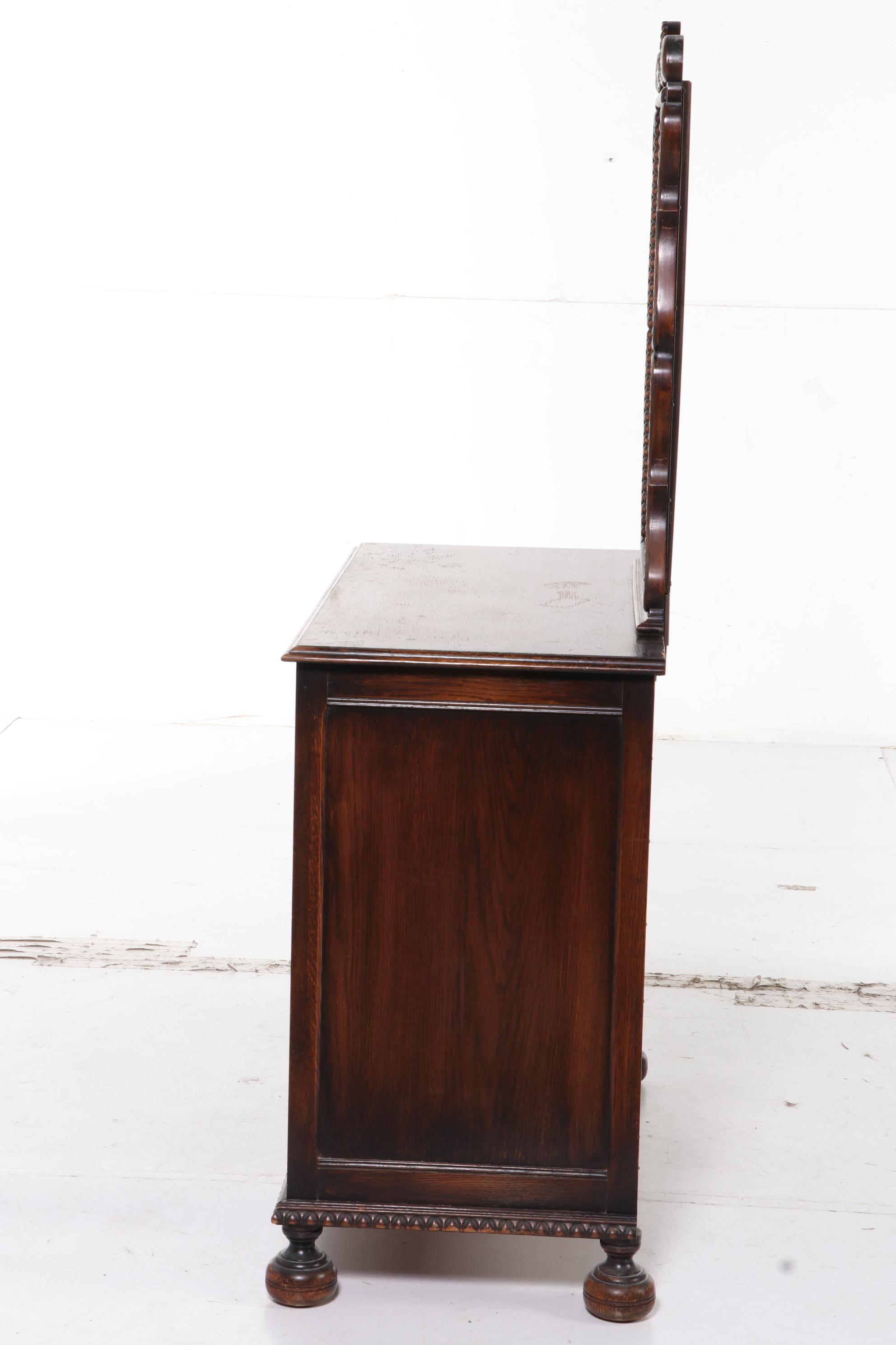 American Furniture Co. Jacobean Style Carved Oak Four-Drawer Dresser