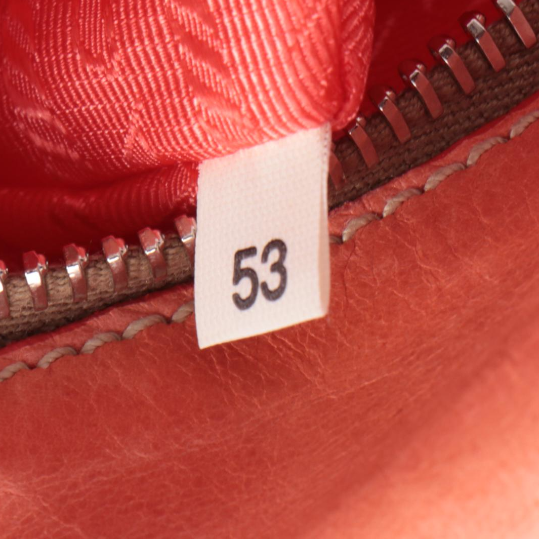 Prada New Look Clutch in Coral Leather