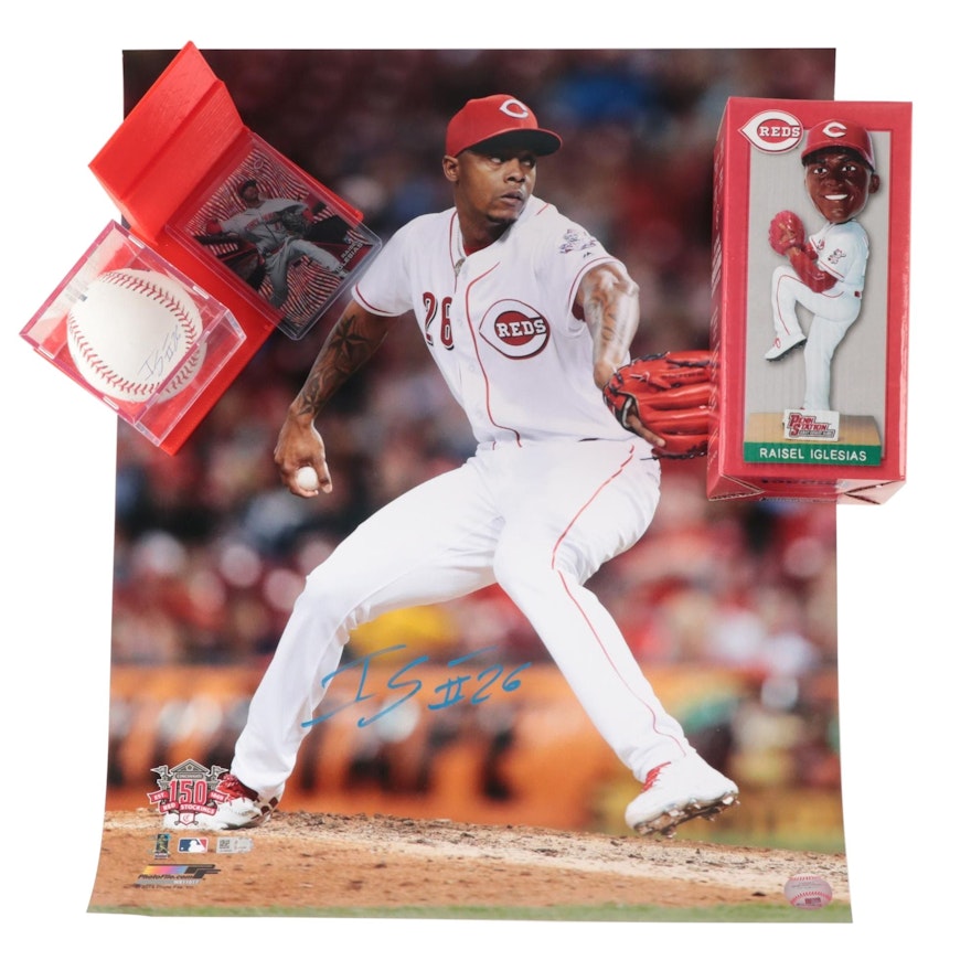 Raisel Iglesias Signed Rawlings MLB Baseball and Photograph with Bobblehead Doll