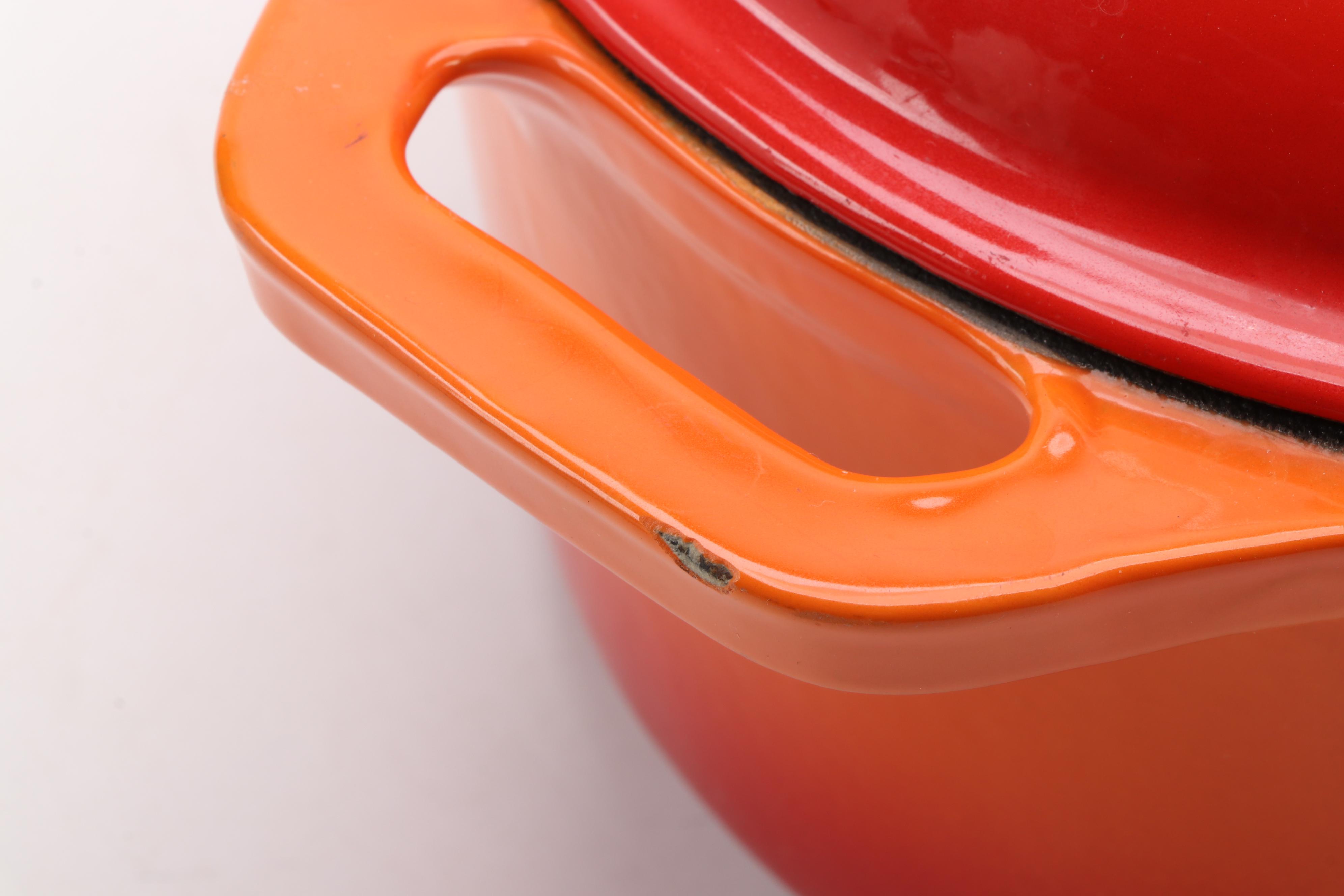 Red and Orange Enameled Cast Iron Dutch Ovens