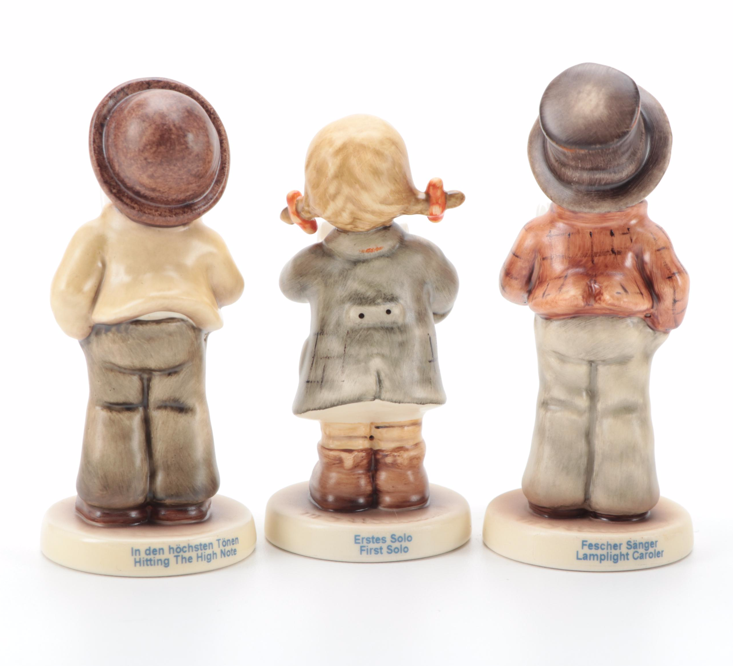 Goebel "Lamplight Caroler" with Other Singer and Musician Porcelain Figurines