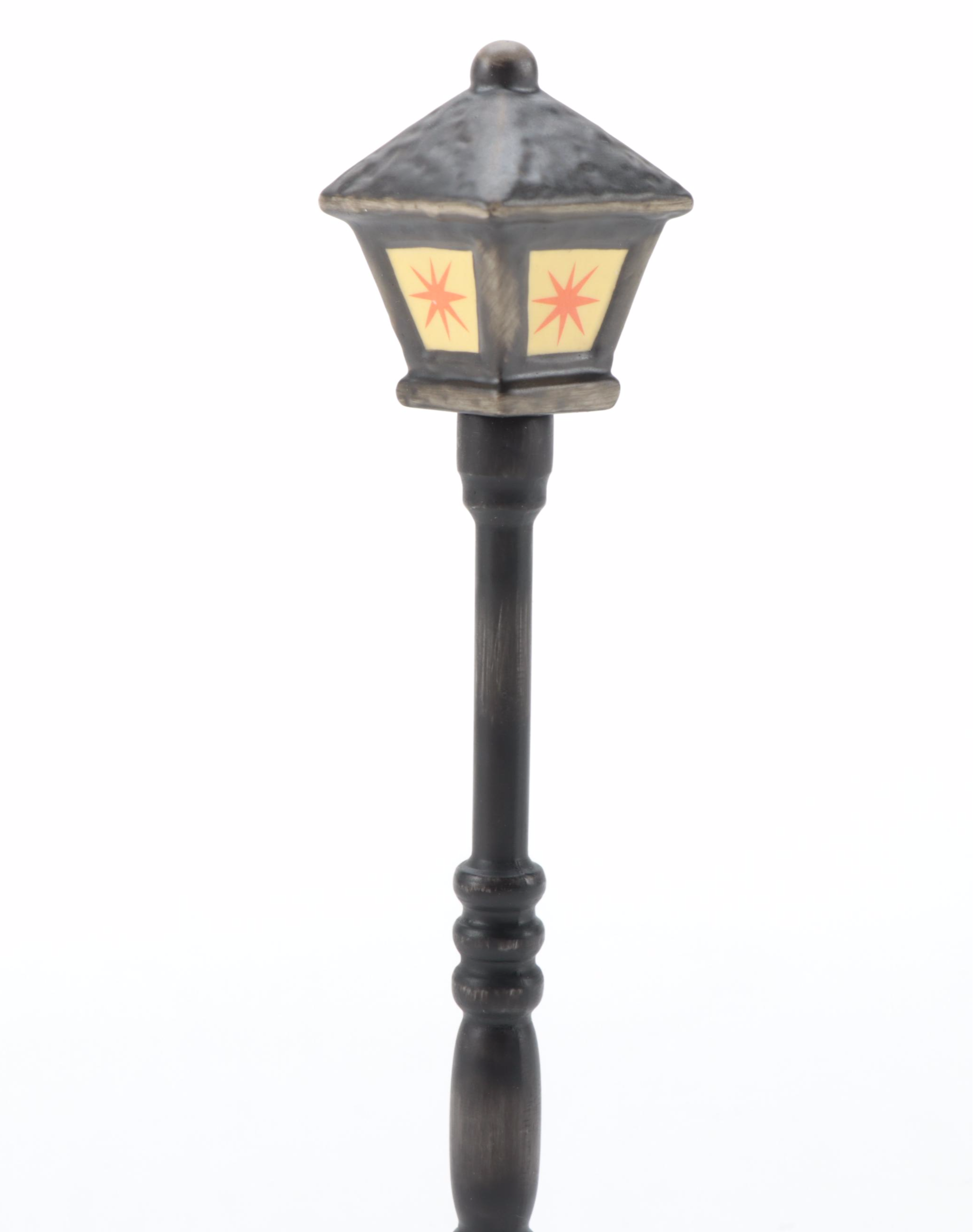 Goebel "Lamplight Caroler" with Other Singer and Musician Porcelain Figurines