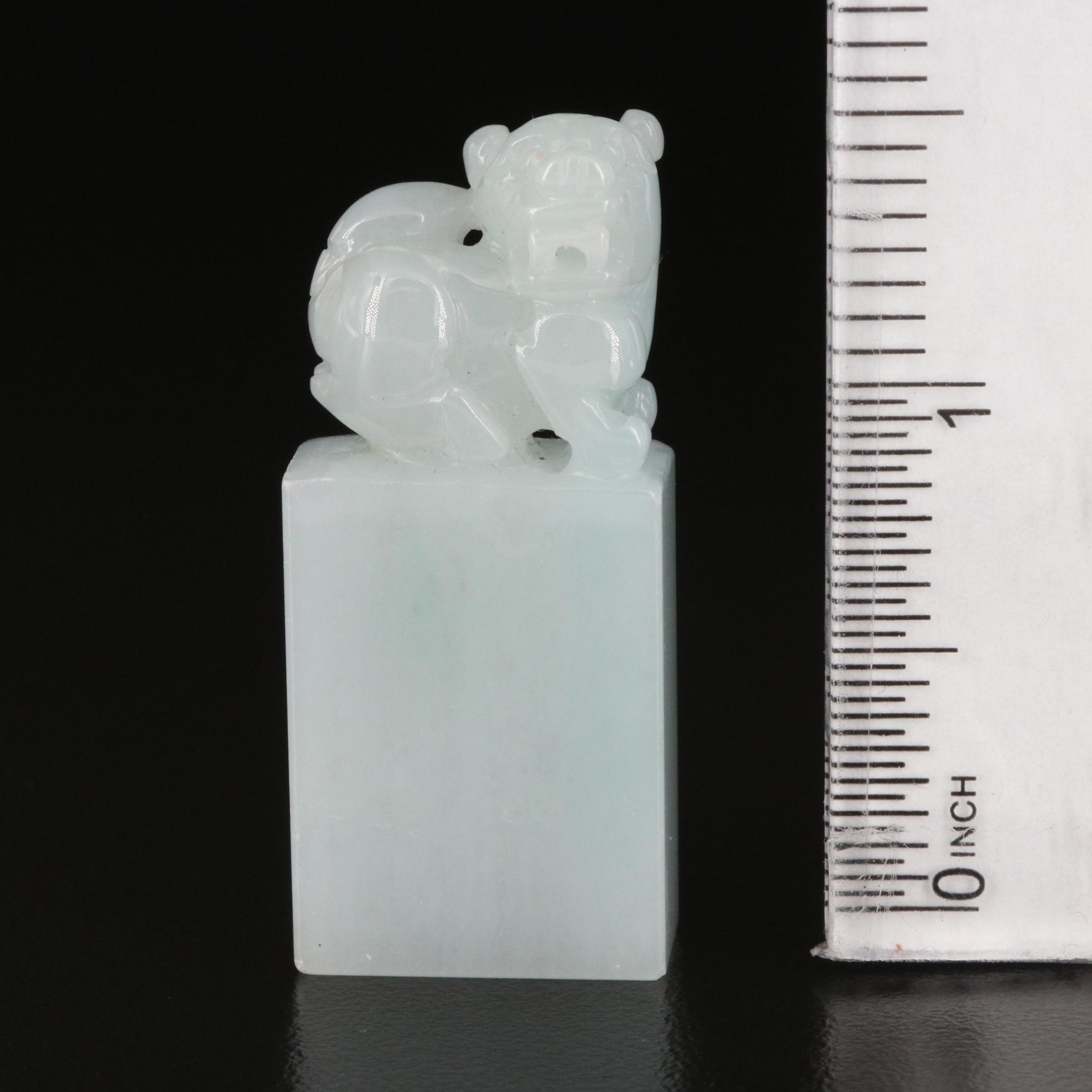 Carved Jadeite Guardian Lion Pendants