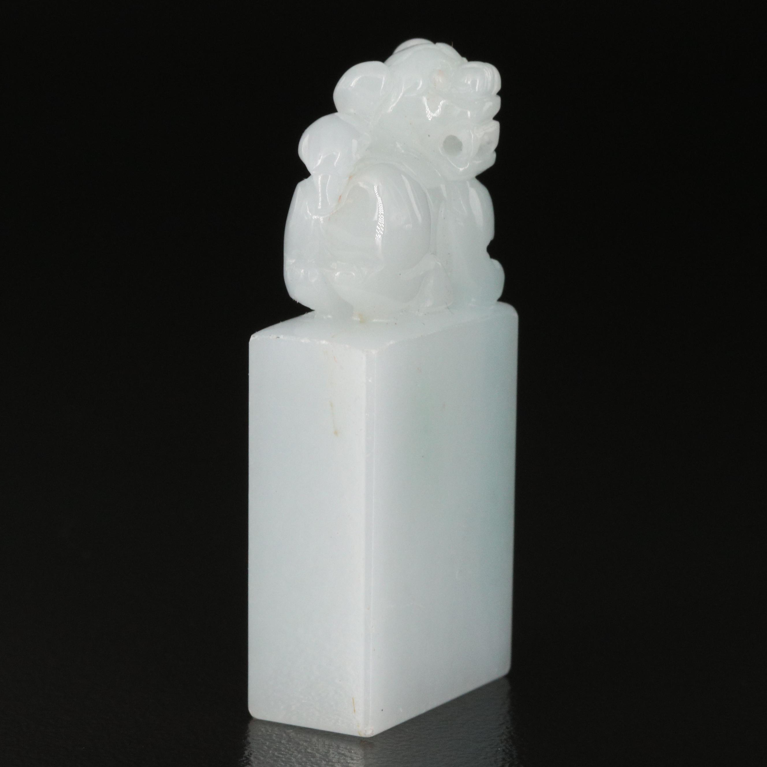 Carved Jadeite Guardian Lion Pendants