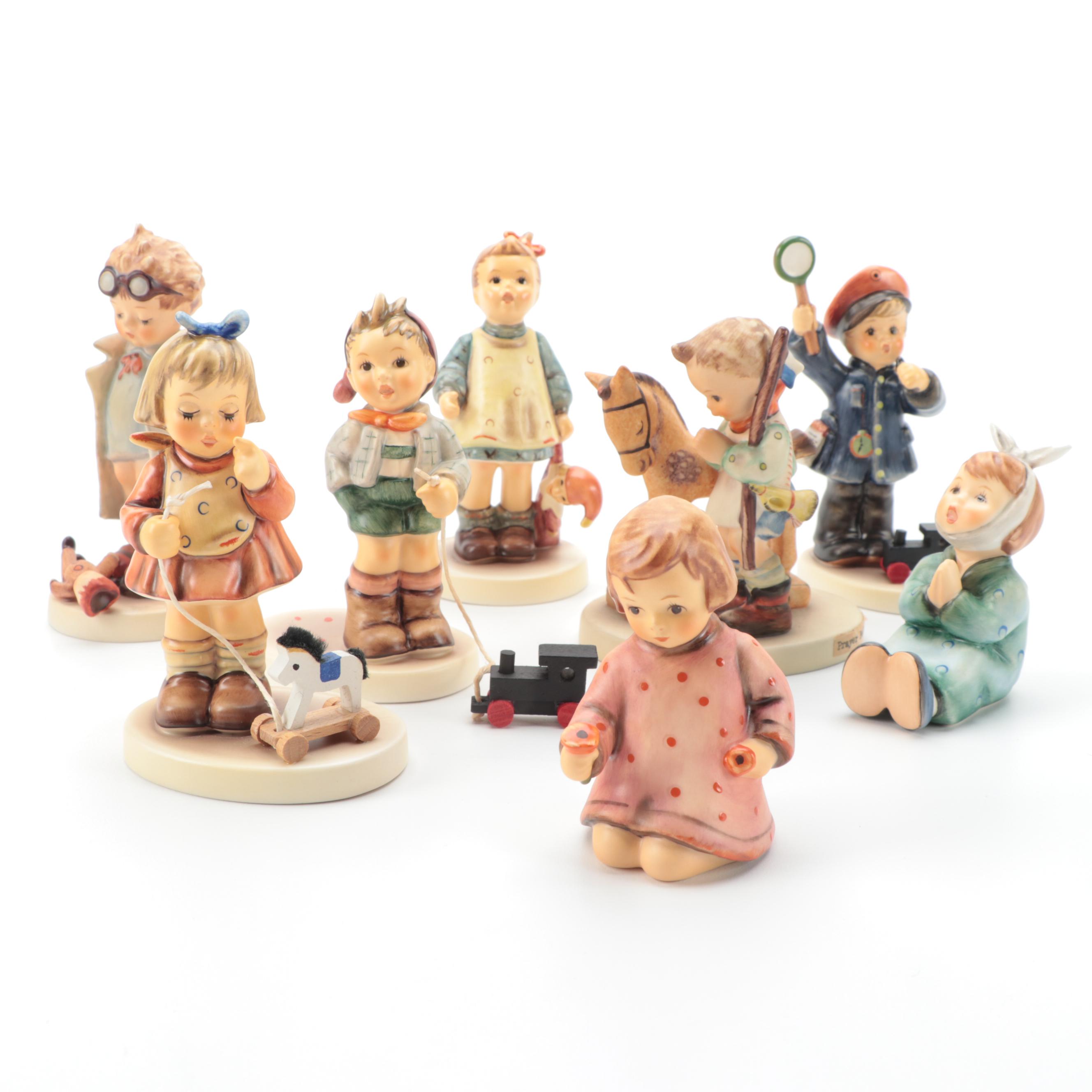 Goebel Porcelain Figurines Including "Fascination", "All Aboard" and Others