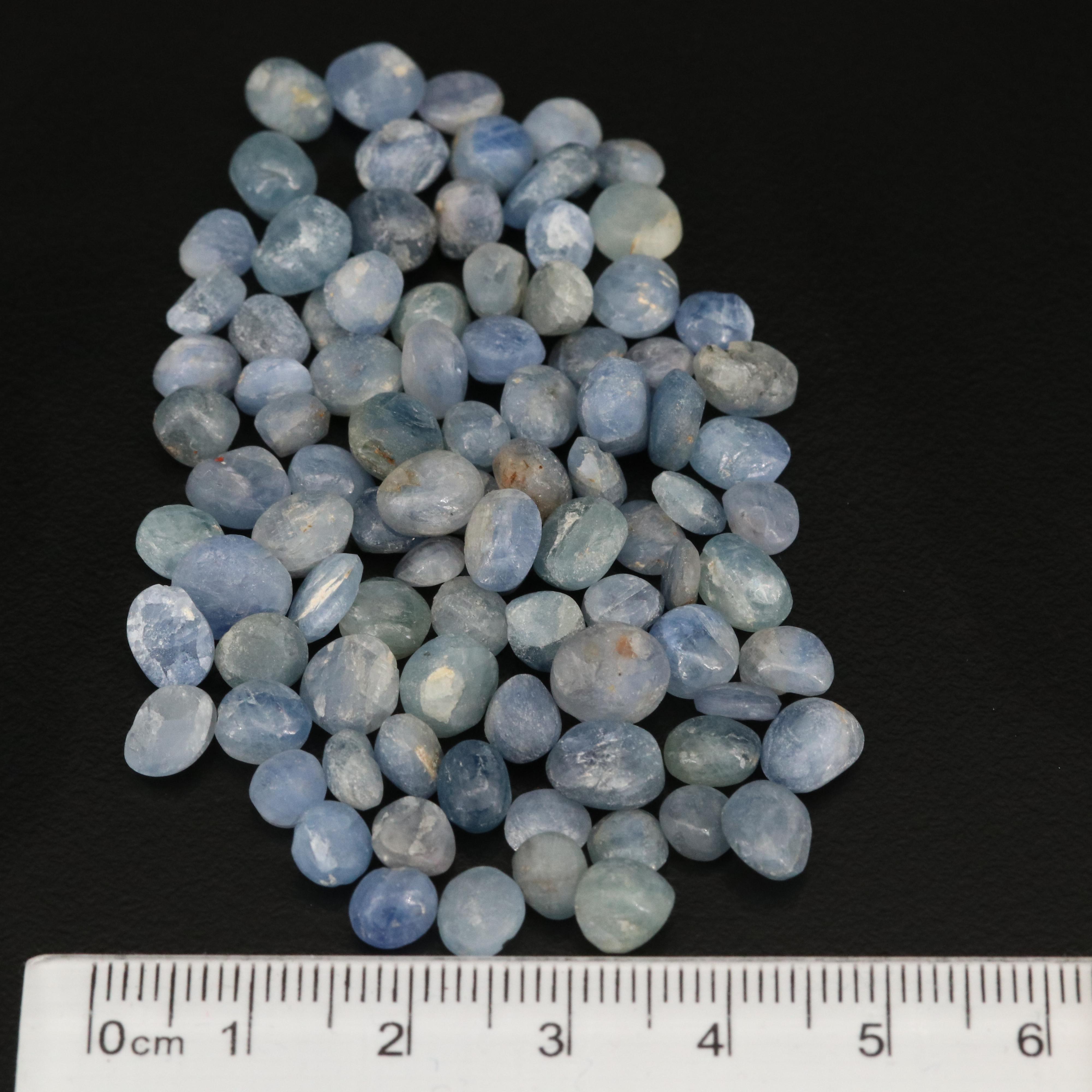 Loose 124.52 CTW Oval and Round Rough Cut Corundum Cabochons