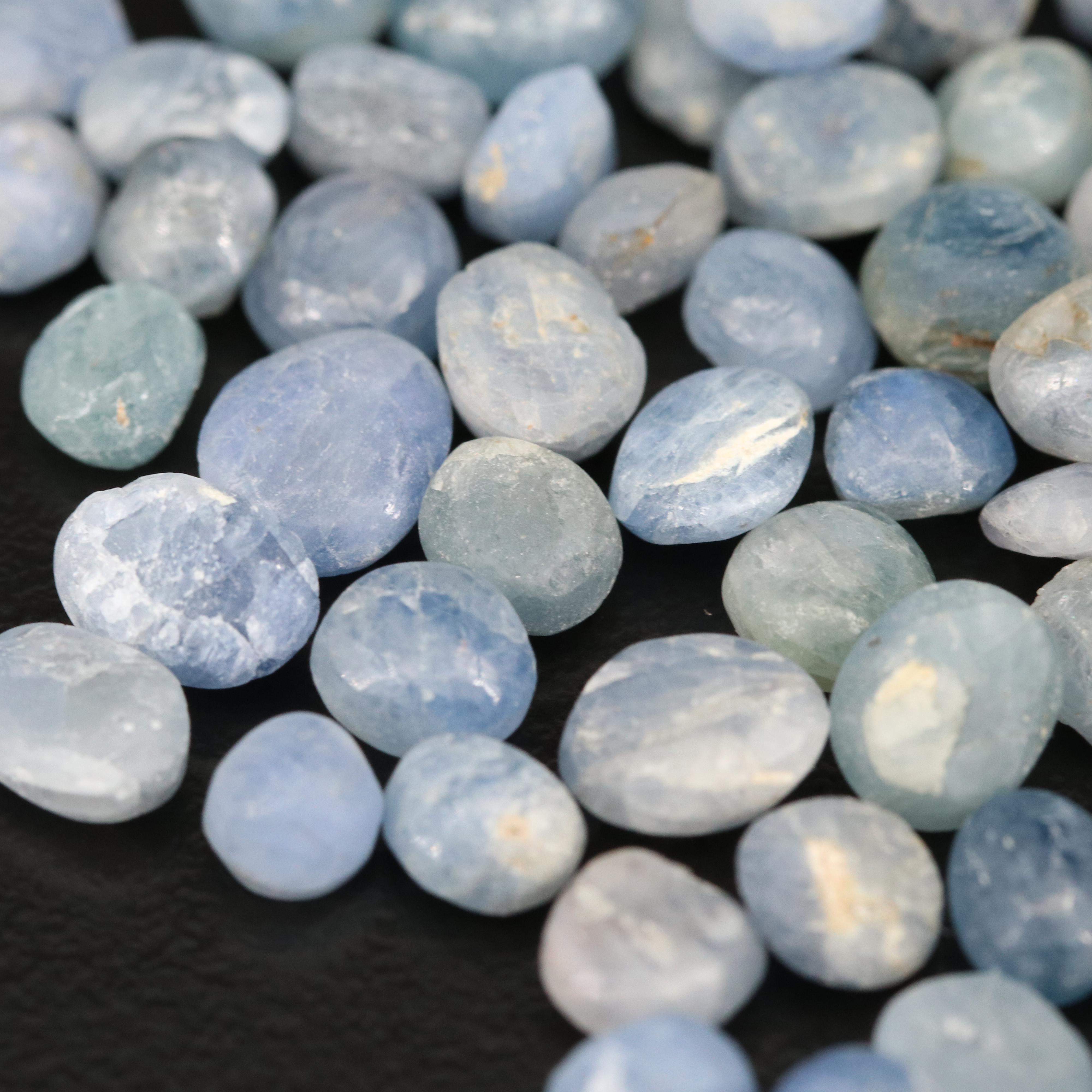 Loose 124.52 CTW Oval and Round Rough Cut Corundum Cabochons