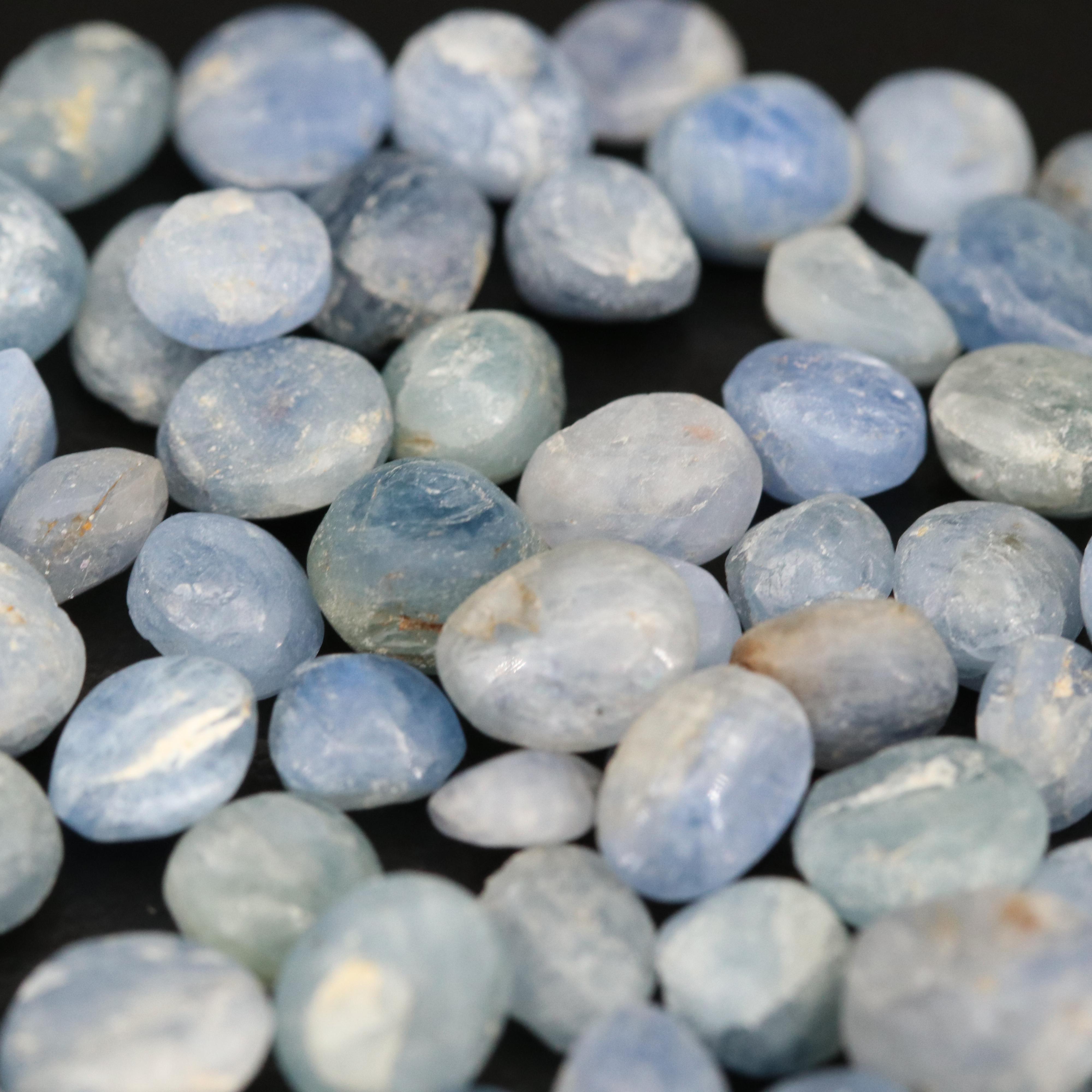 Loose 124.52 CTW Oval and Round Rough Cut Corundum Cabochons