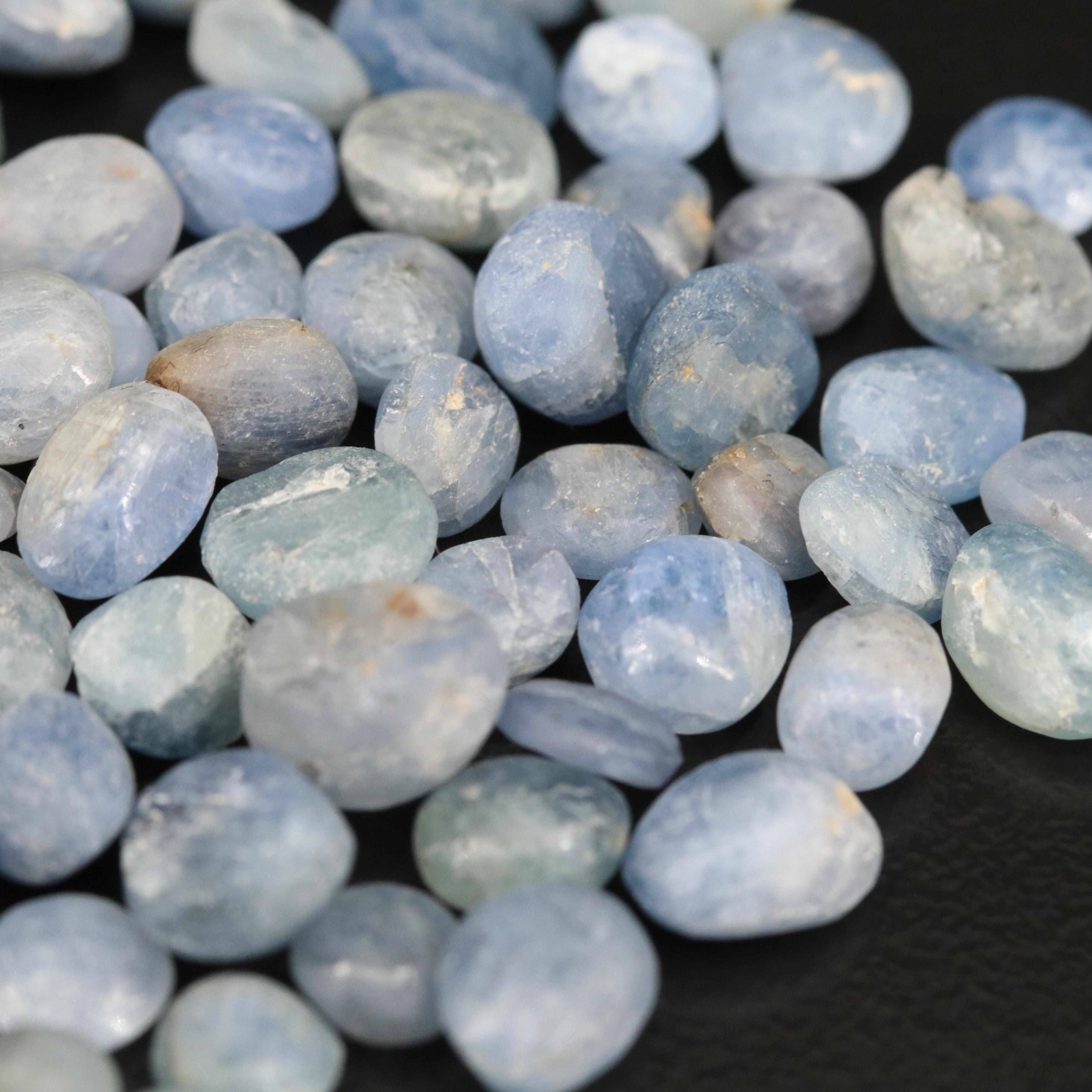 Loose 124.52 CTW Oval and Round Rough Cut Corundum Cabochons