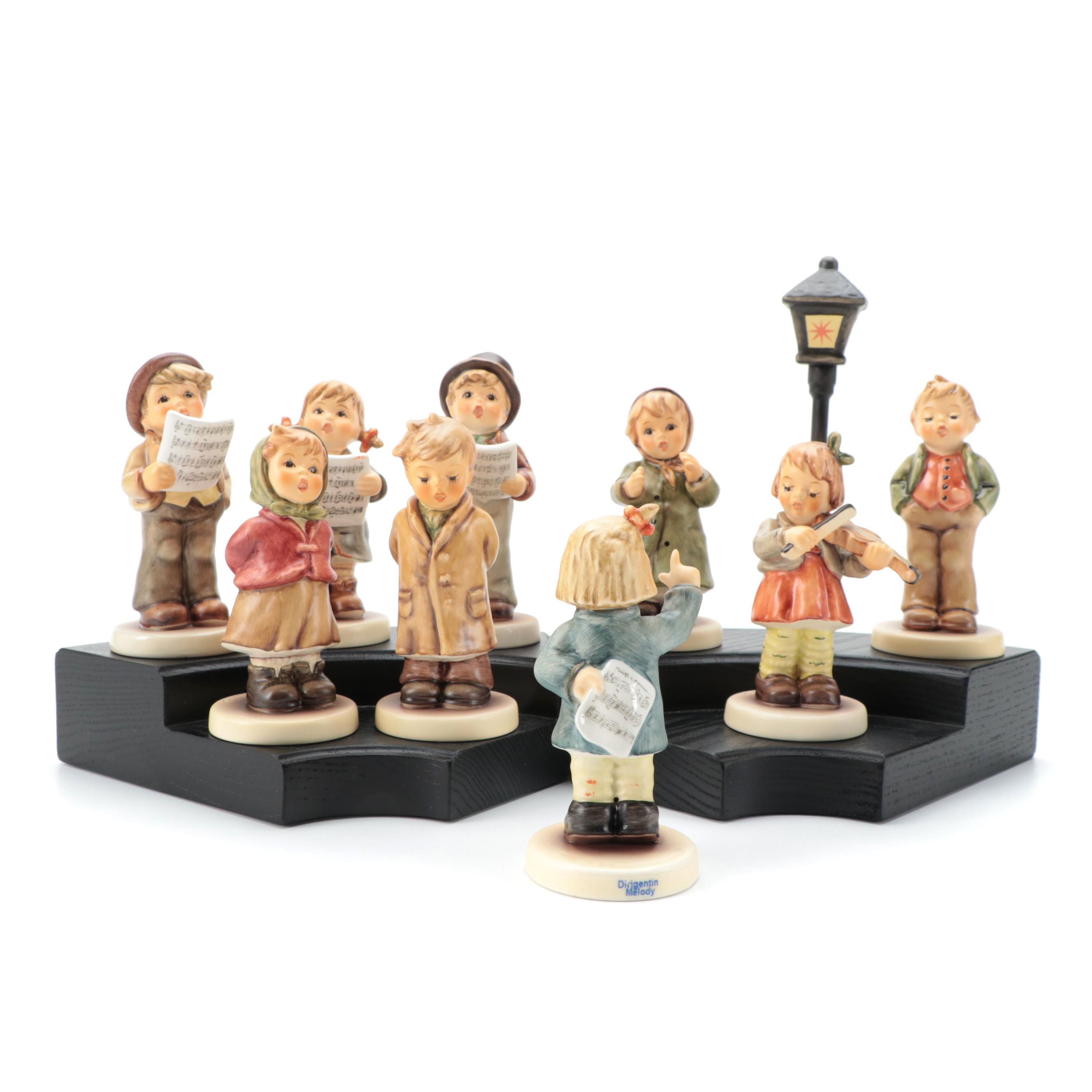 Goebel "Lamplight Caroler" with Other Singer and Musician Porcelain Figurines