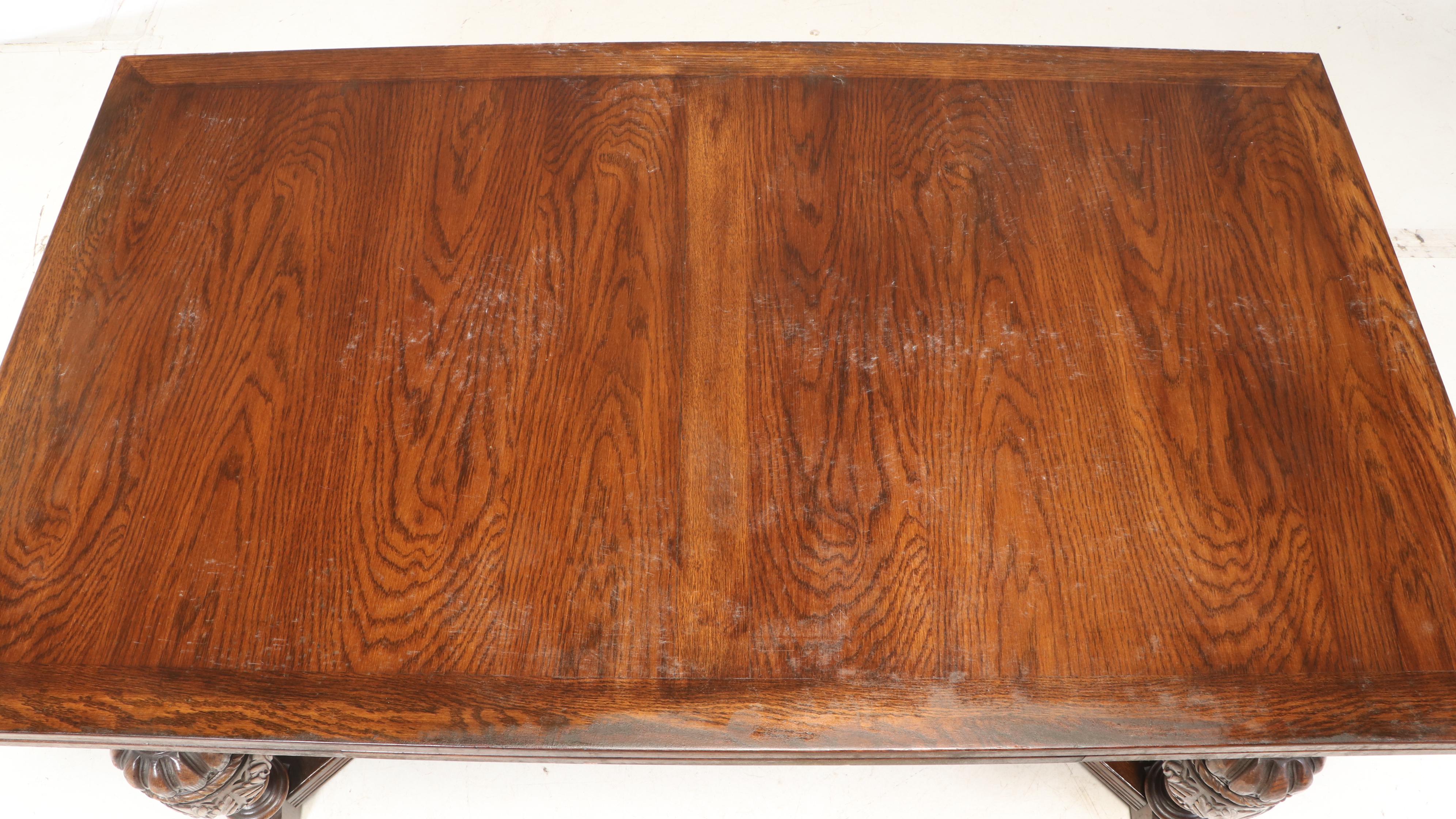 Eleven-Piece Jacobean Style Carved Oak Dining Set, Early 20th Century