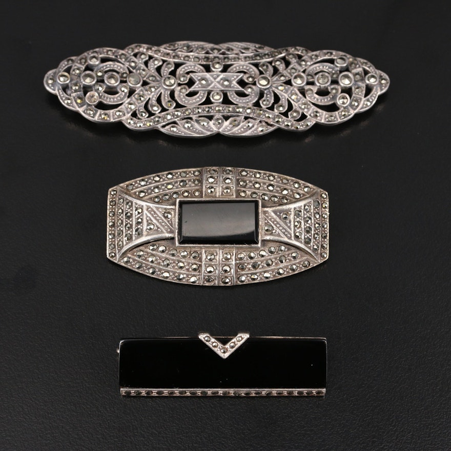 Sterling Brooches Including Black Onyx and Marcasite