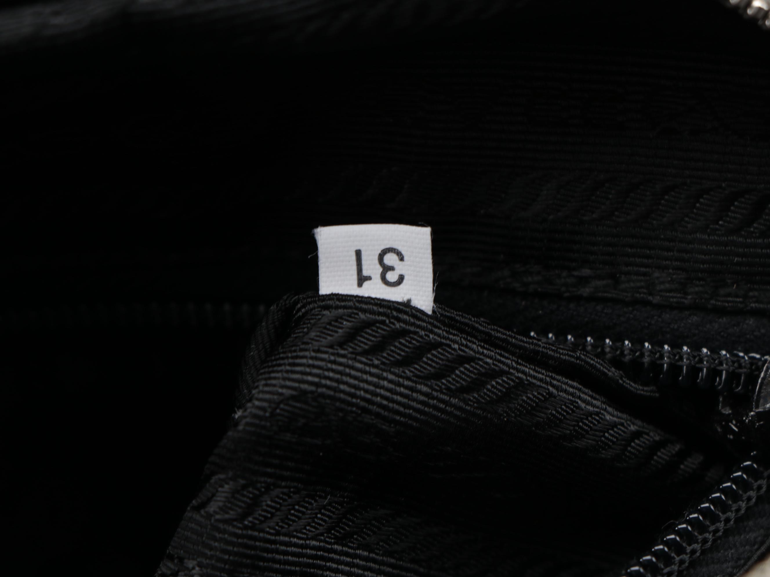 Prada Vitello Drive Perforated Bowler Bag in Black Leather