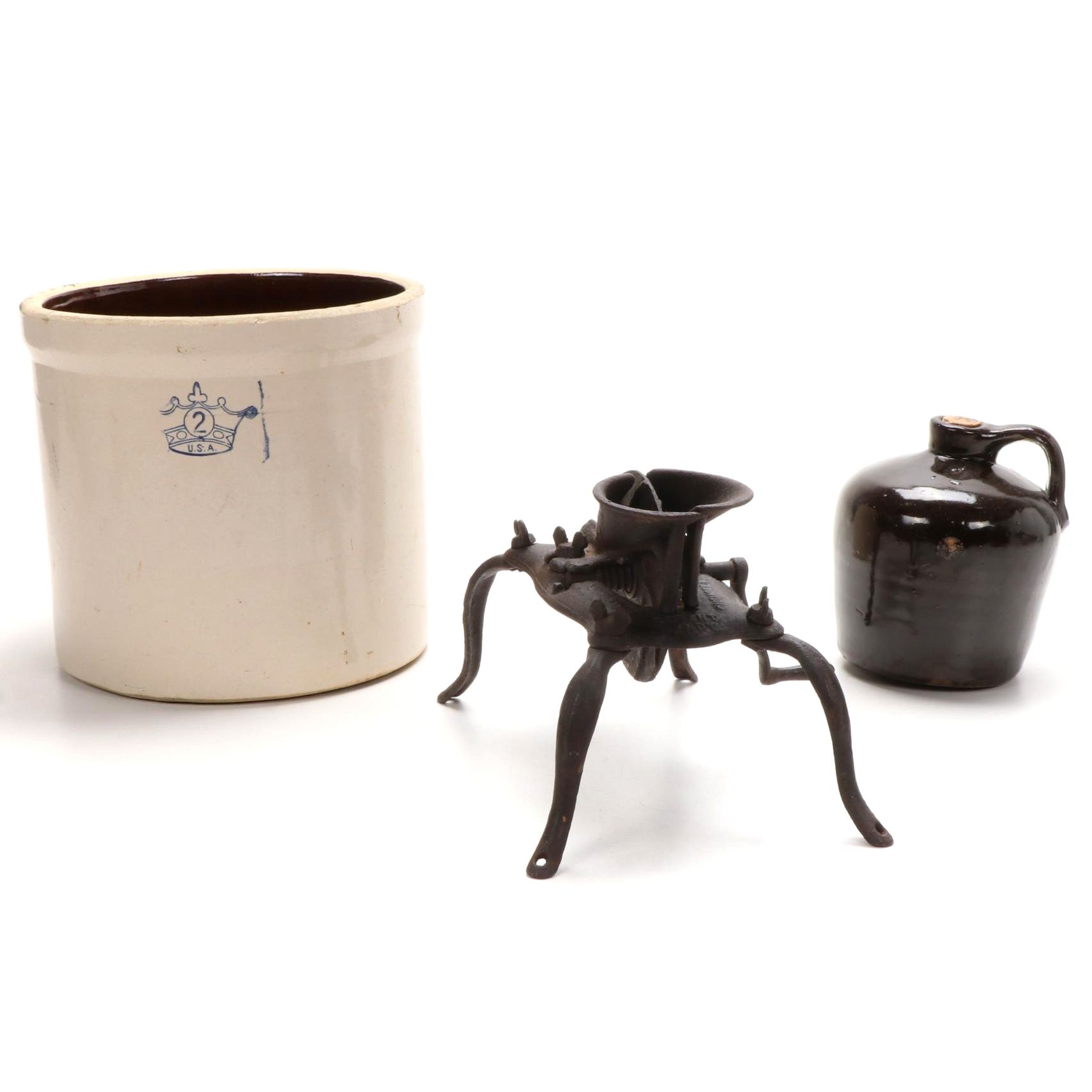 Robinson Ransbottom Blue Crown Crock, Jug, and Cast Iron Cherry Pitter