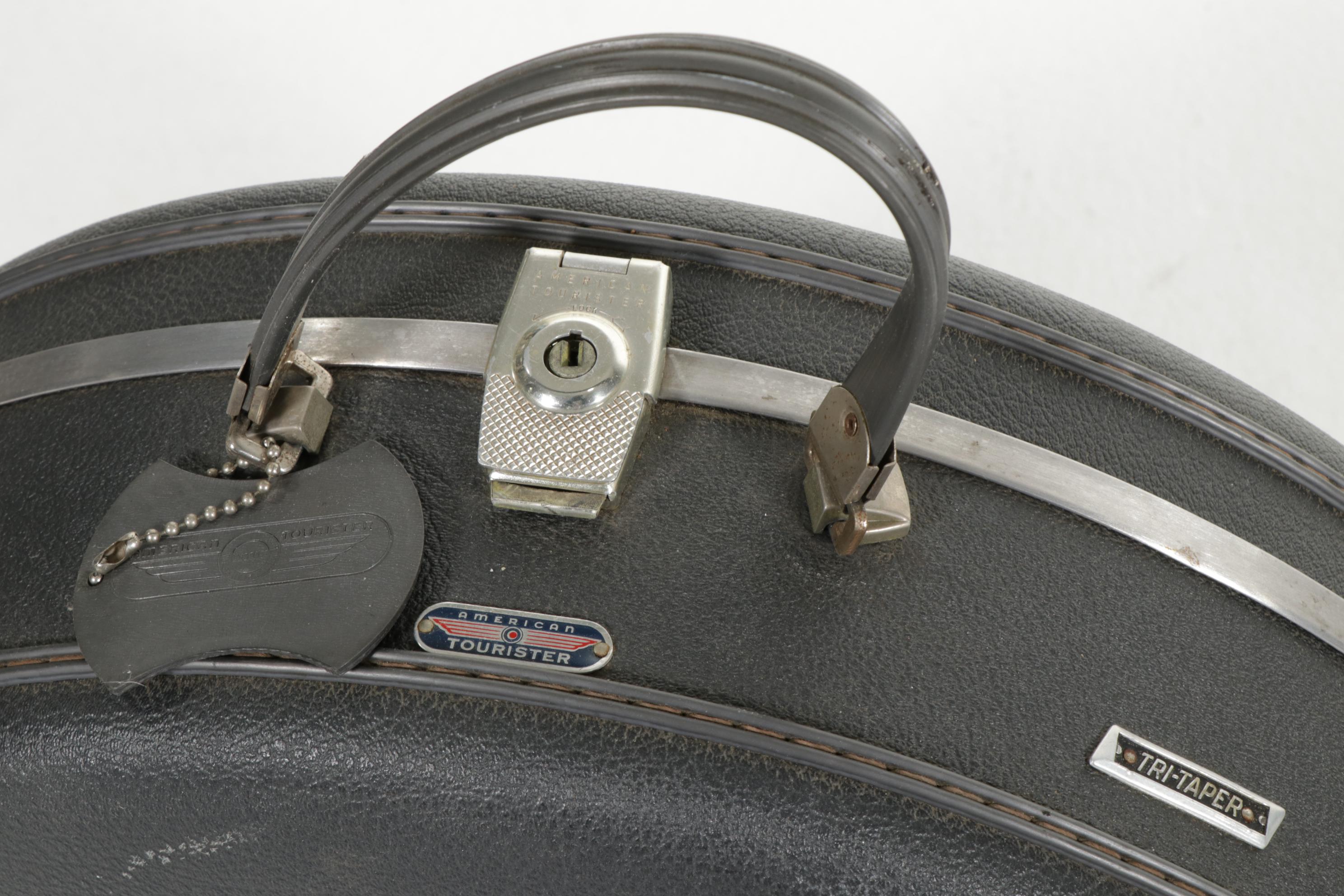 American Tourister Luggage and Skymaster Custom Crafted Leather Suitcase