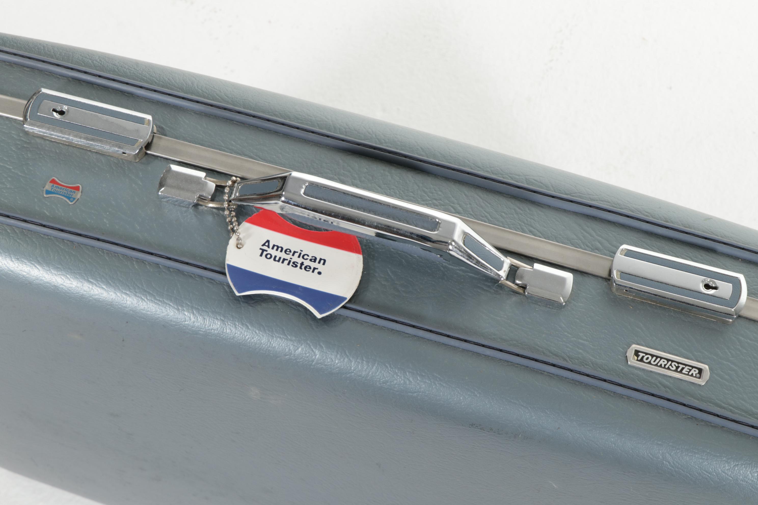 American Tourister Luggage and Skymaster Custom Crafted Leather Suitcase