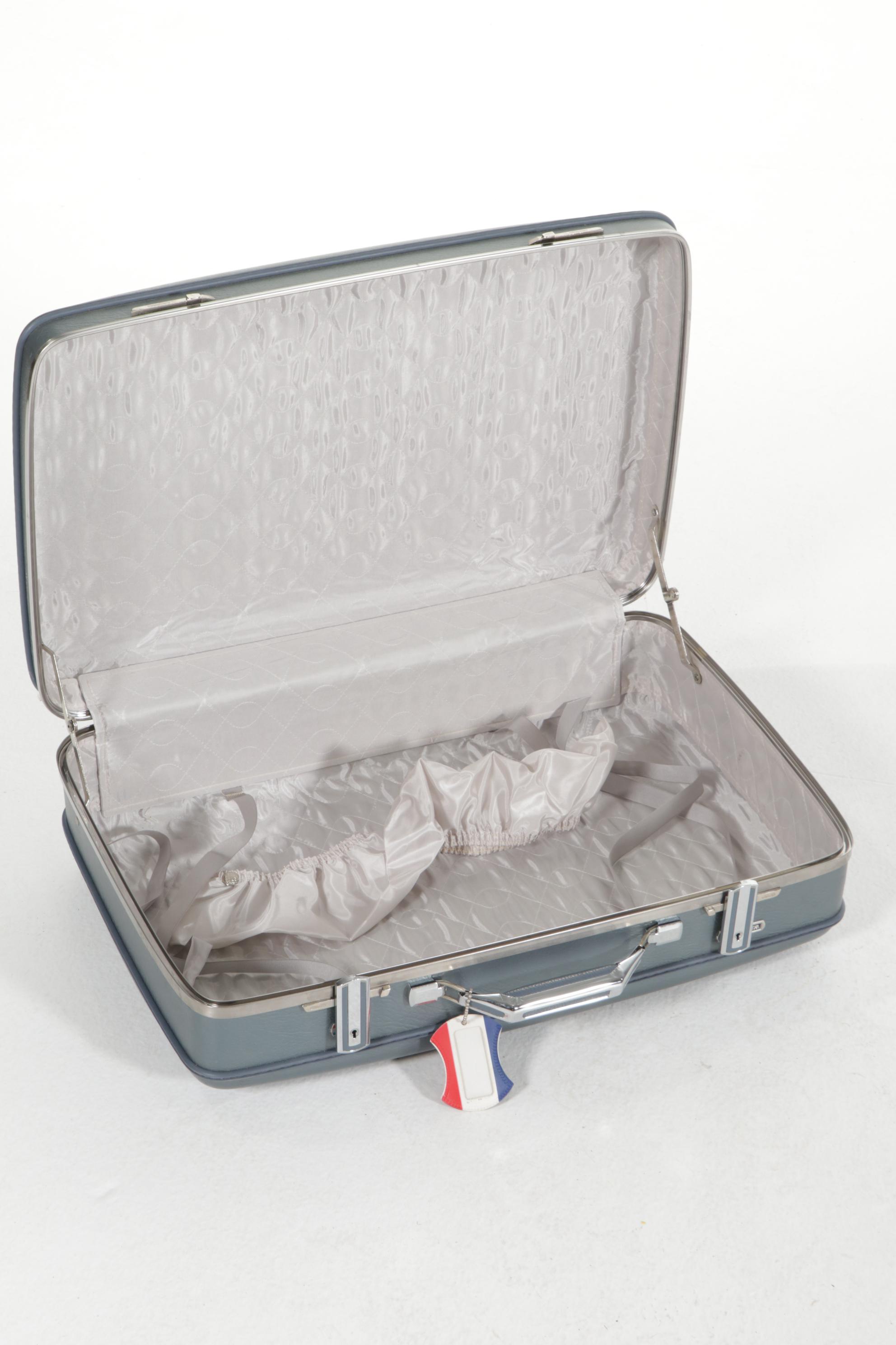 American Tourister Luggage and Skymaster Custom Crafted Leather Suitcase