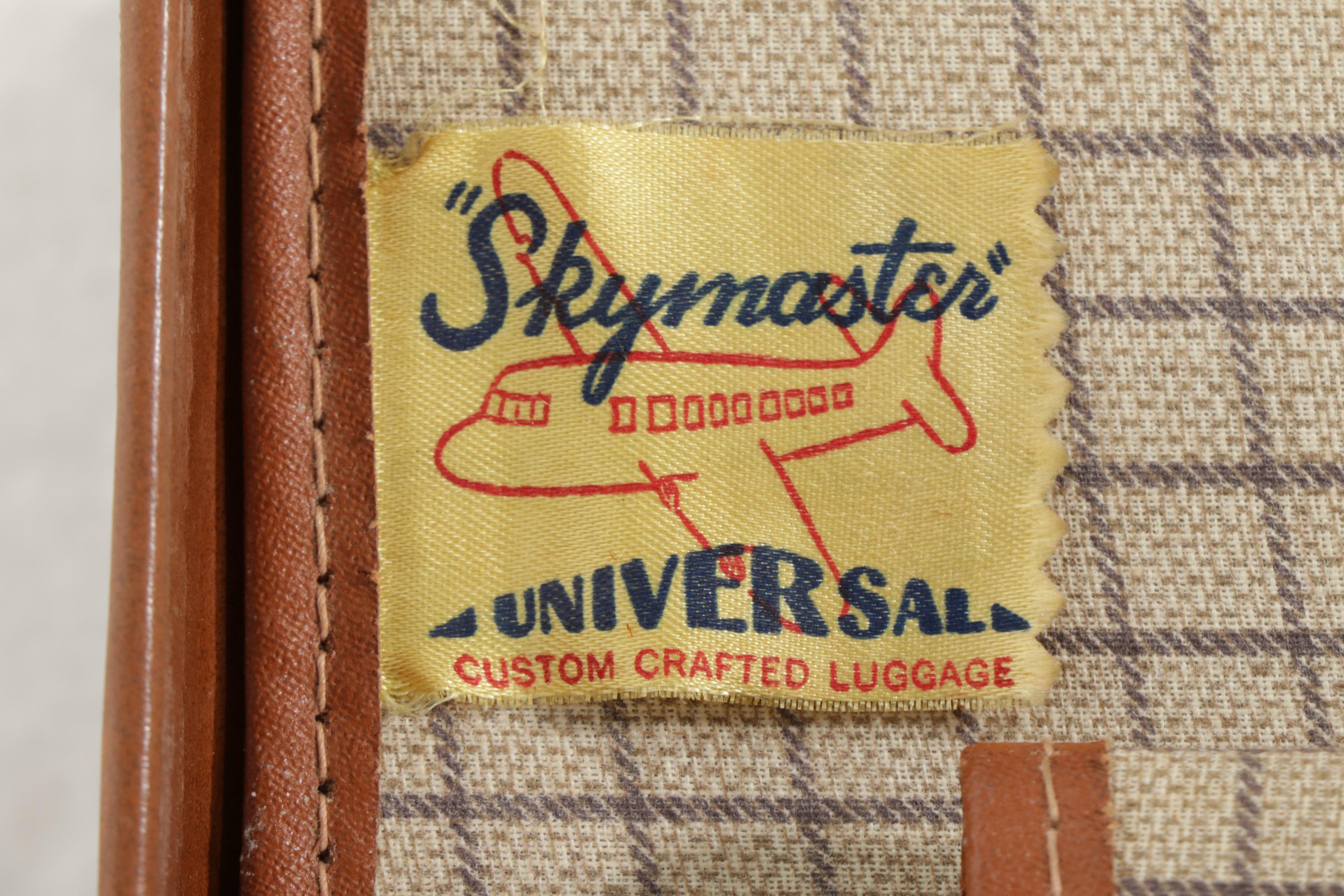 American Tourister Luggage and Skymaster Custom Crafted Leather Suitcase