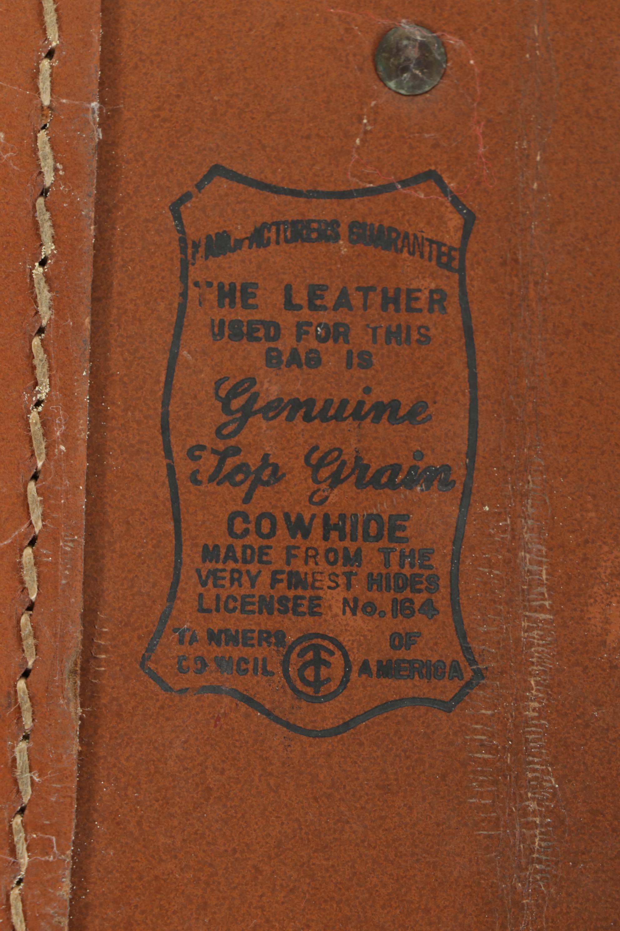 American Tourister Luggage and Skymaster Custom Crafted Leather Suitcase