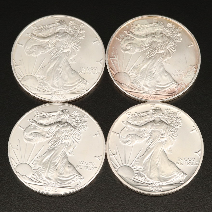 Four $1 American Silver Eagle Coins