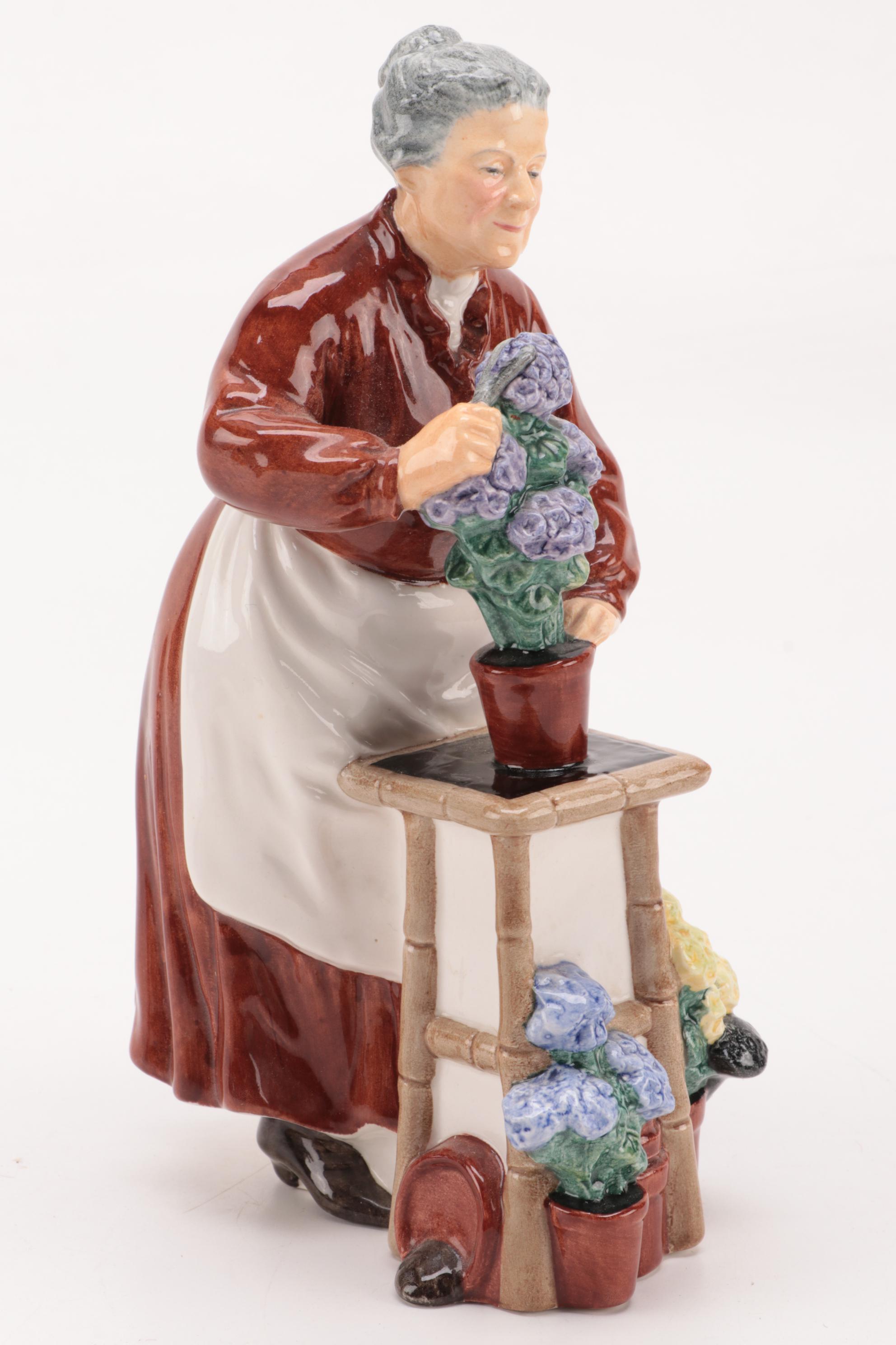Royal Doulton "Flora" and "The Lobster Man" Ceramic Figurines