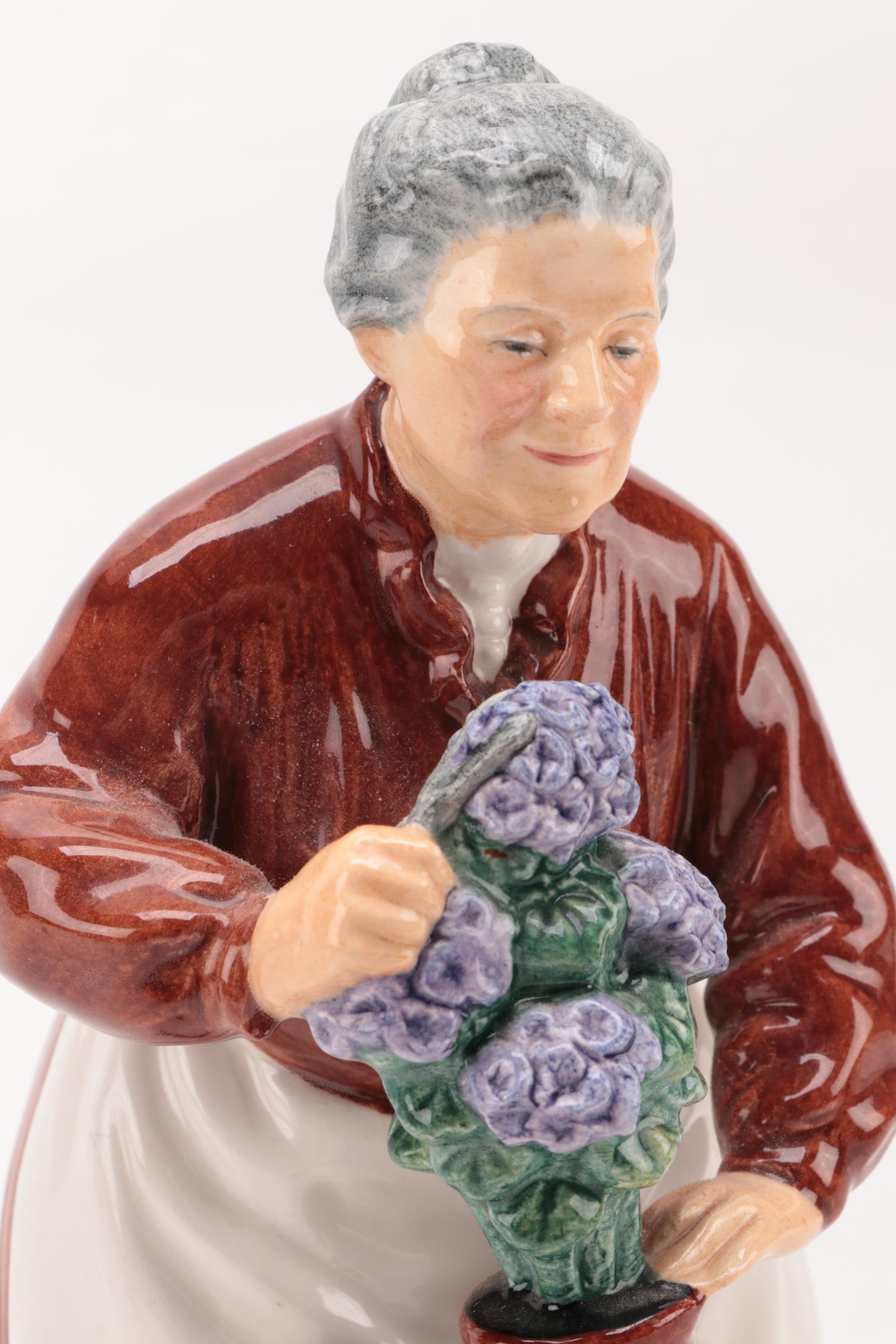 Royal Doulton "Flora" and "The Lobster Man" Ceramic Figurines