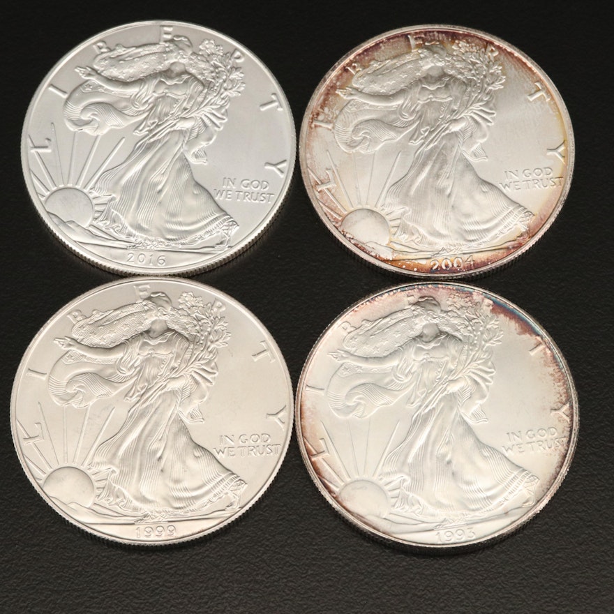 Four .999 Fine American Silver Eagle Coins