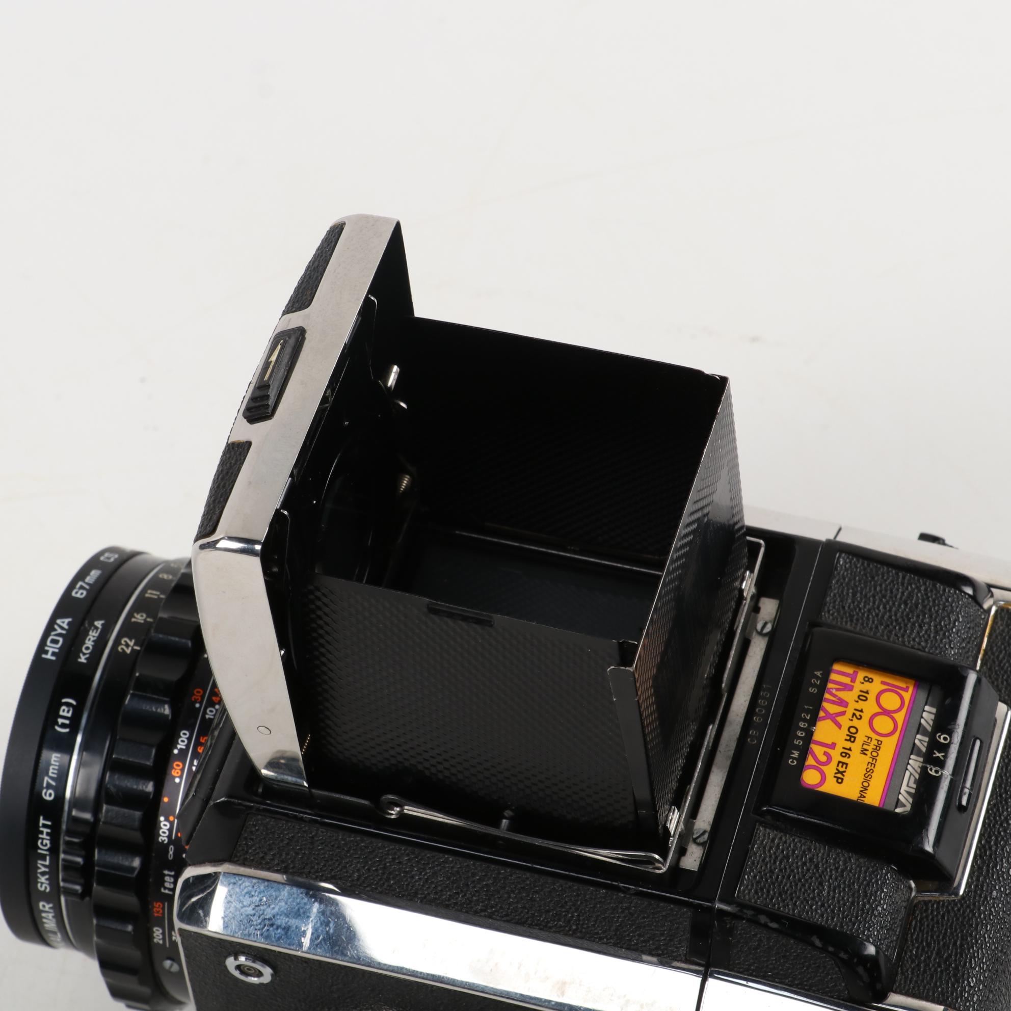 Zenza Bronica SLR Camera with Strap, Grip, Lens and Extra Film Back