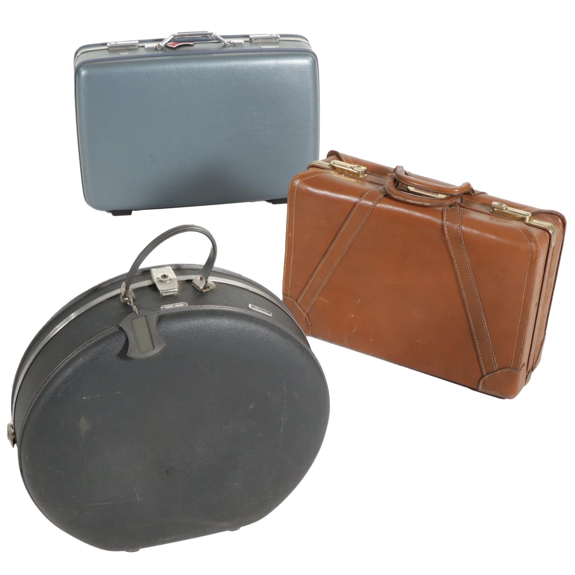 American Tourister Luggage and Skymaster Custom Crafted Leather Suitcase