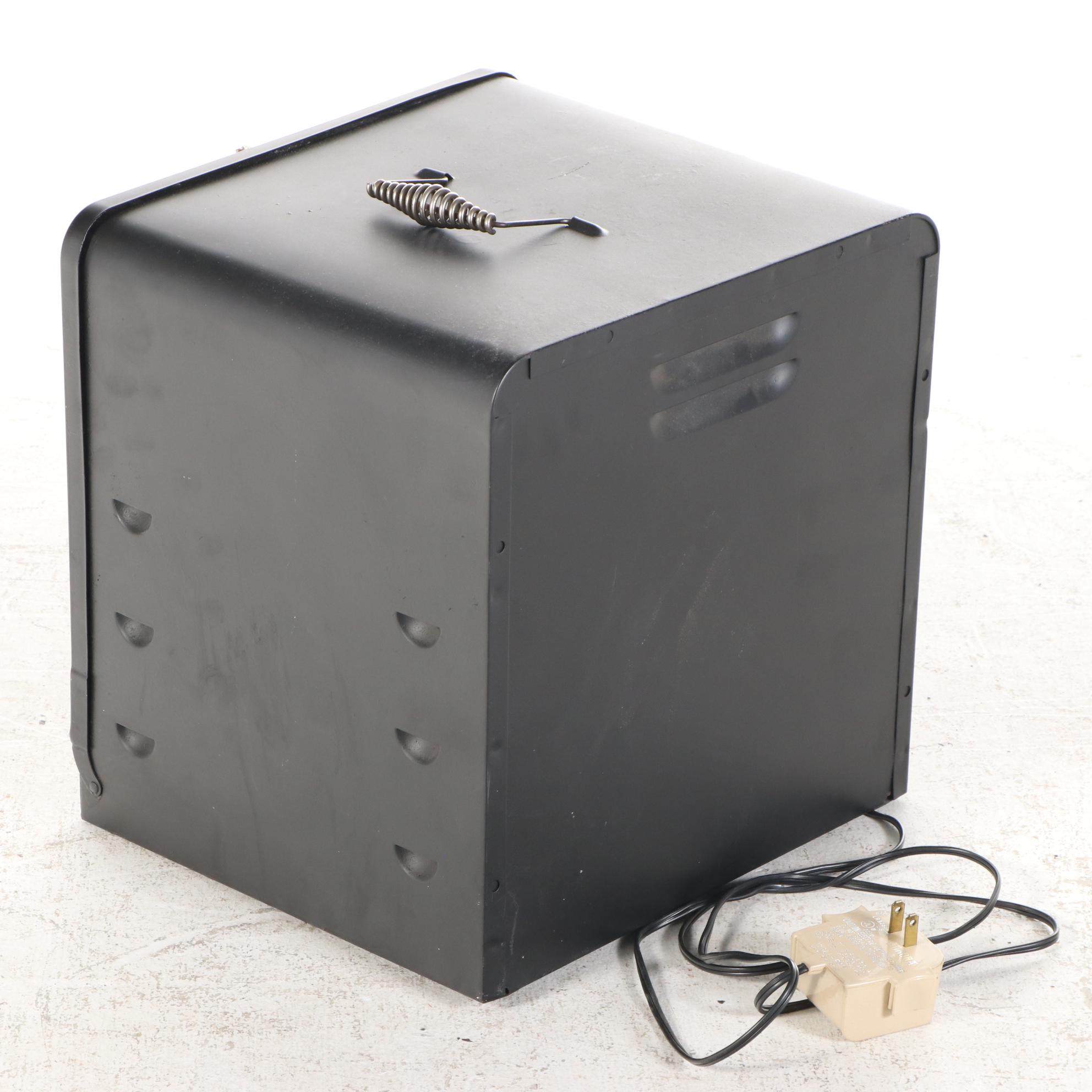 Illuminated Diorama with Miniature Furniture in Heater Housing