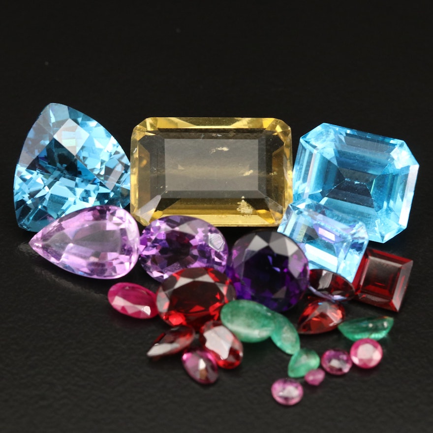 Loose 57.32 CTW Faceted Gemstones Including Topaz, Amethyst and Ruby