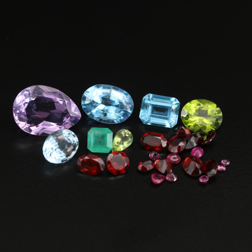 Loose 39.73 CTW Gemstones Including Amethyst, Topaz and Garnet