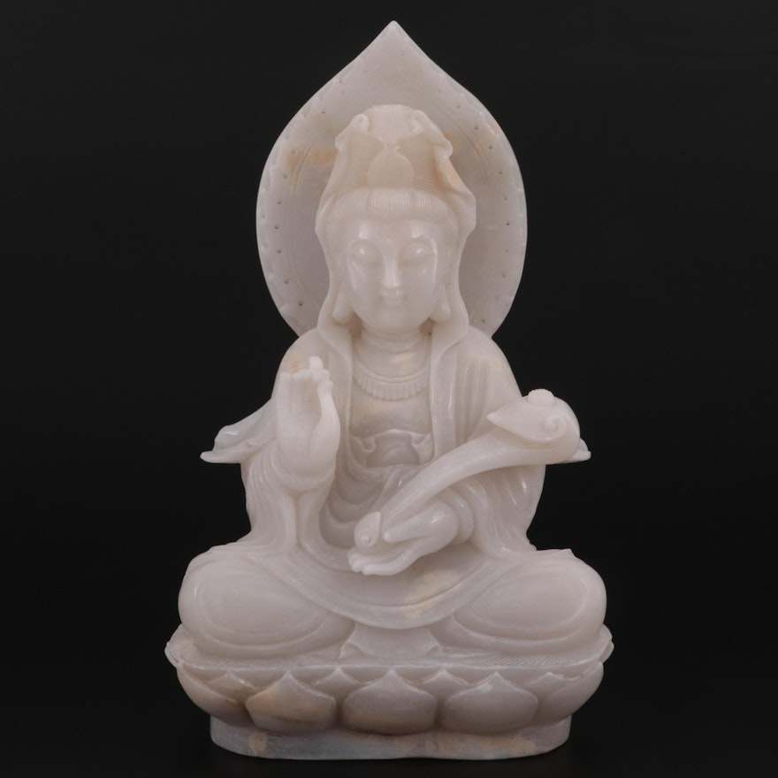 Chinese Carved Quartzite Figure of Guan Yin Seated on a Lotus Throne